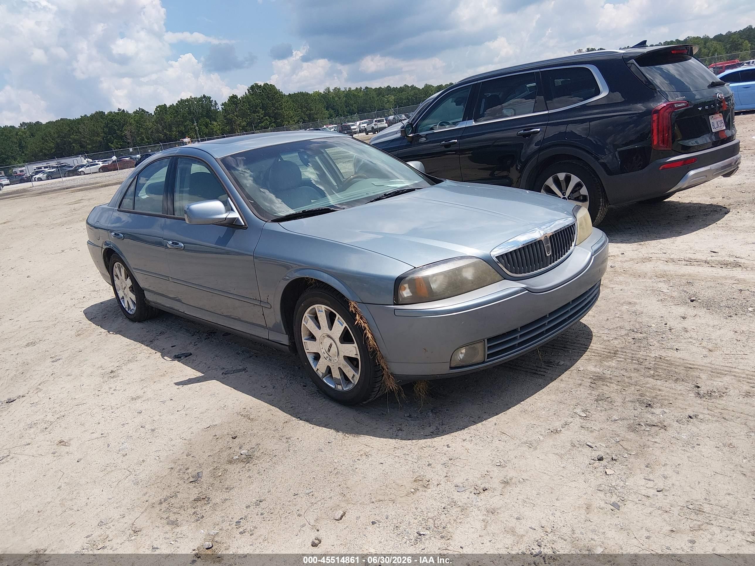 2004 Lincoln LS Sport, VIN 1LNHM87A24Y675582 — Бок
