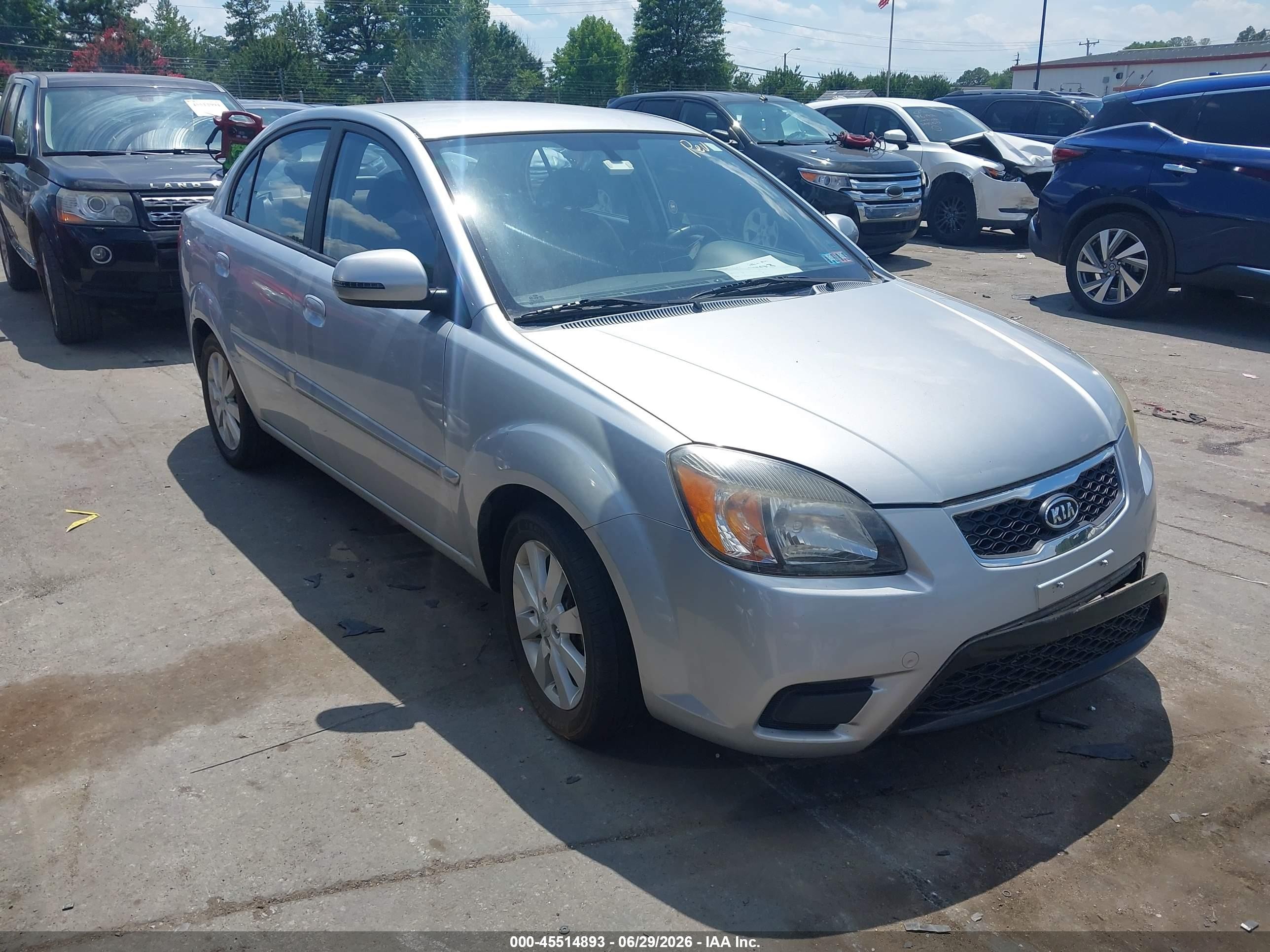 2011 Kia Rio LX, VIN KNADH4A30B6912523 — Обычный износ