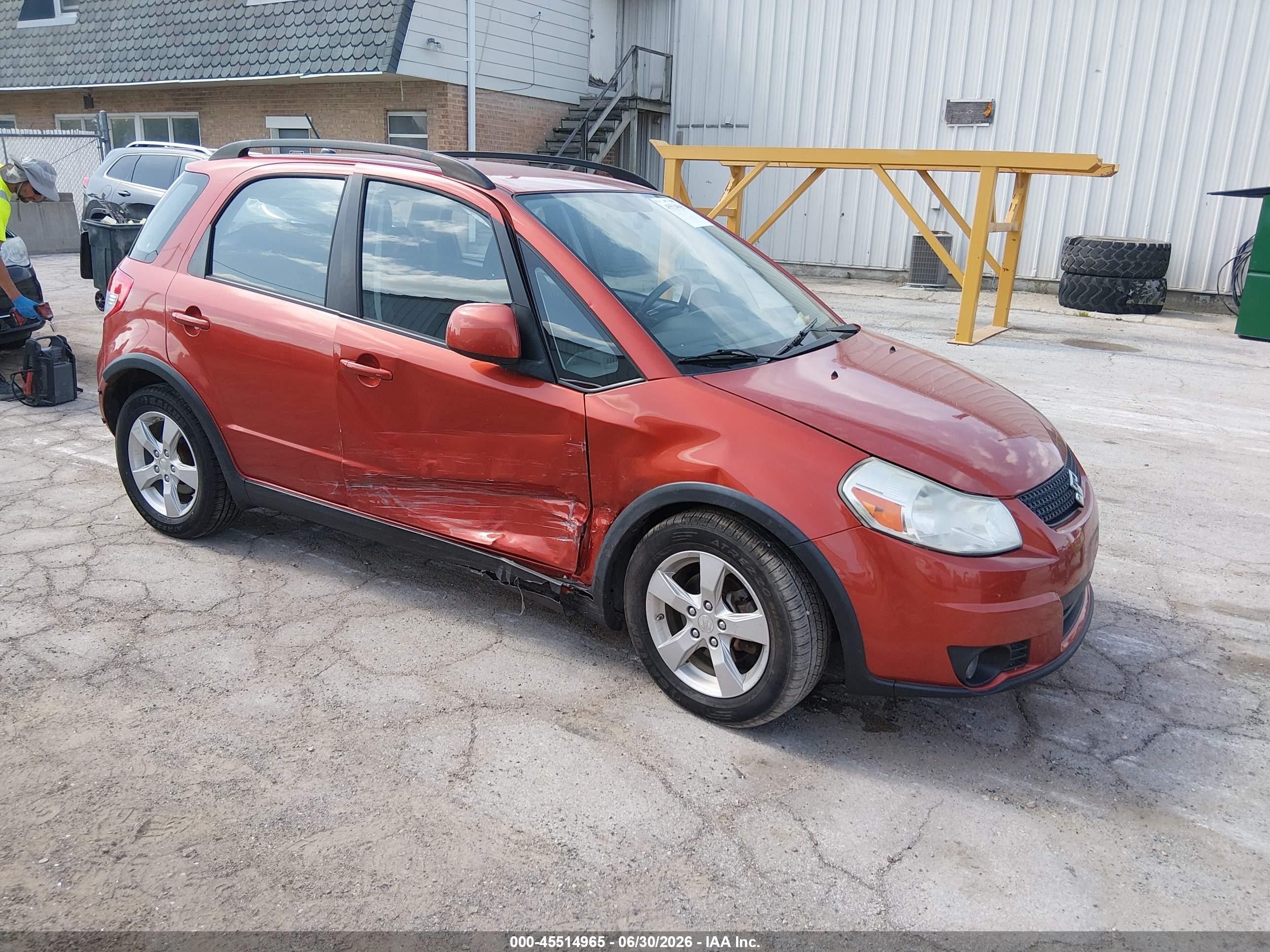 2011 Suzuki SX4 Crossover, VIN JS2YB5A3XB6301853 — Side