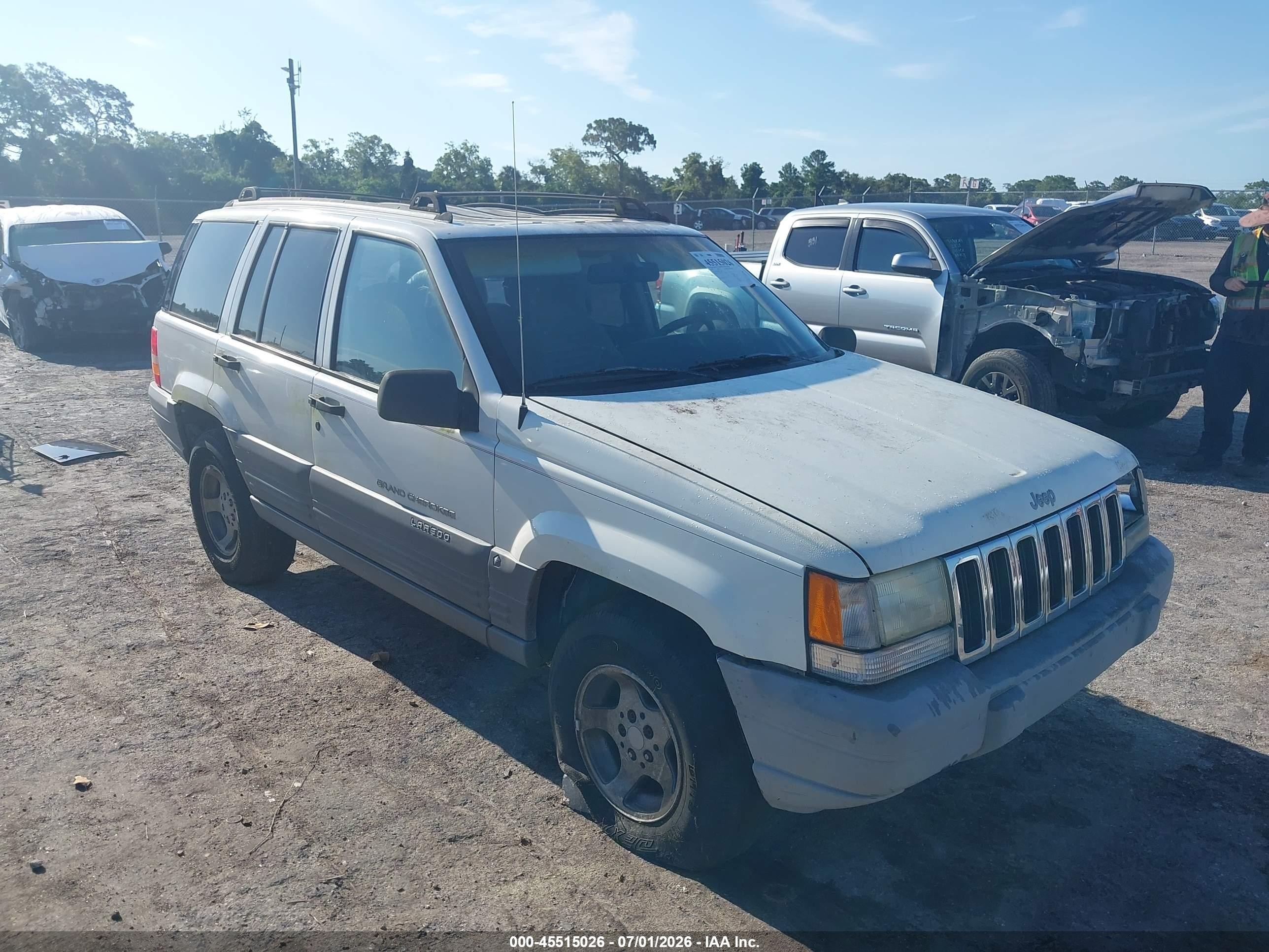 1997 Jeep Grand Cherokee TSi, VIN 1J4FX58S2VC730906 — Side