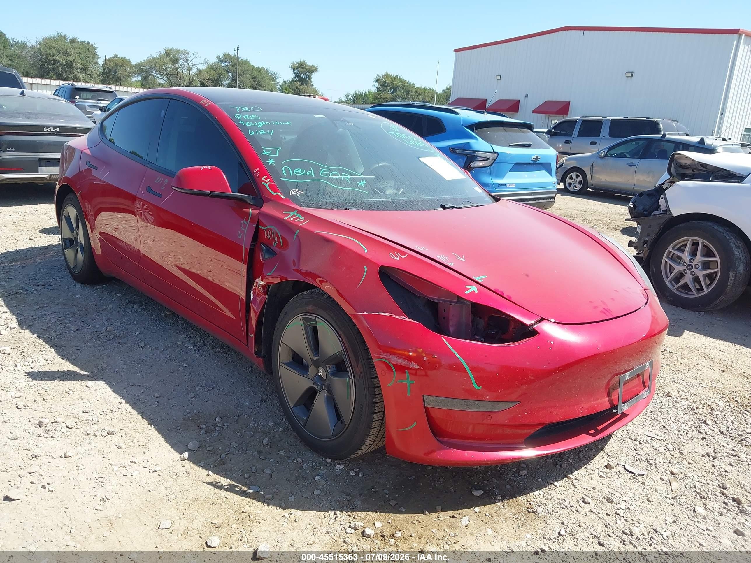 2021 Tesla Model 3 Standard Range Plus, VIN 5YJ3E1EA2MF090412 — Front end