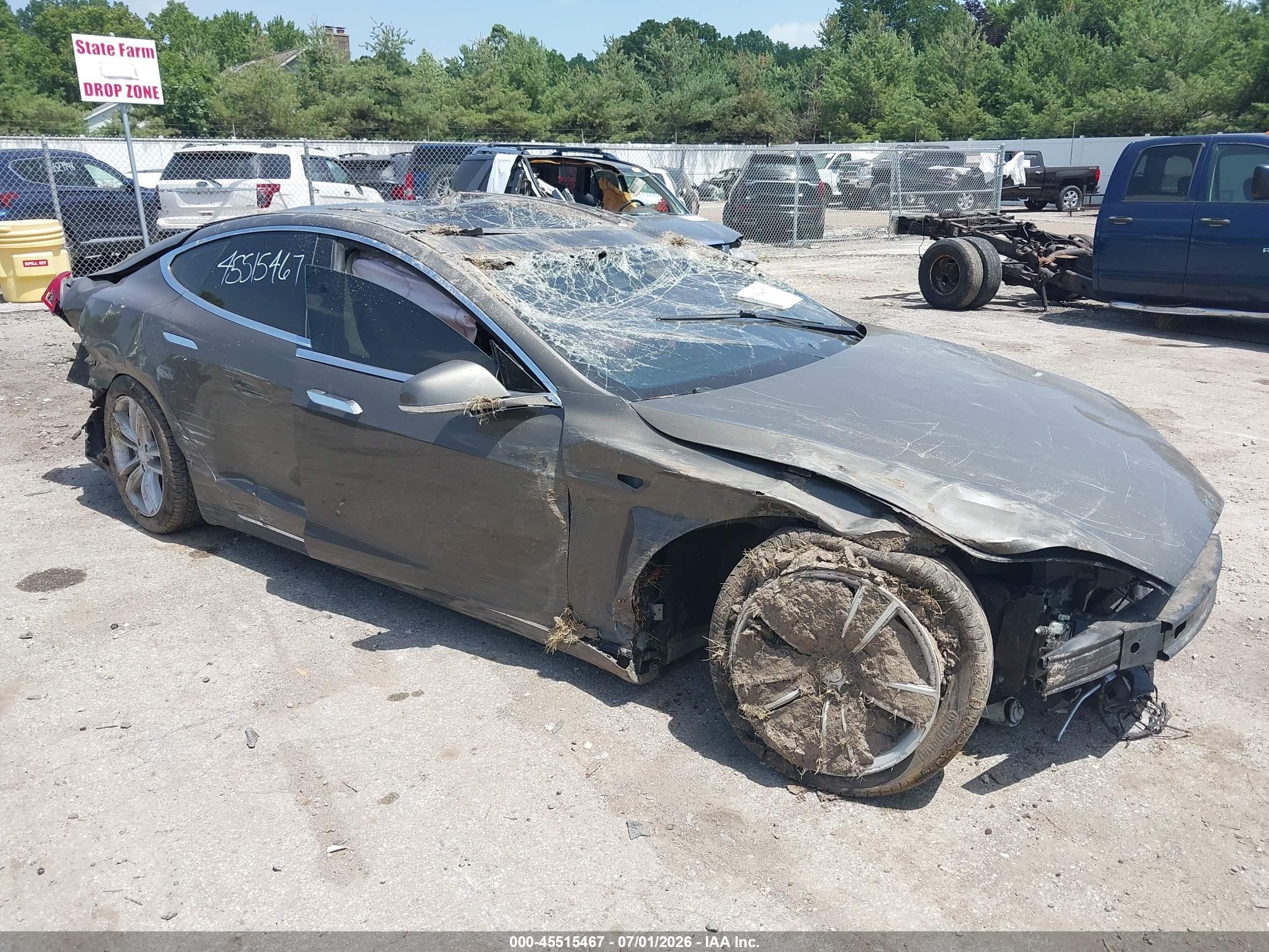 2015 Tesla Model S 85D, VIN 5YJSA1E28FF118801 — Rollover