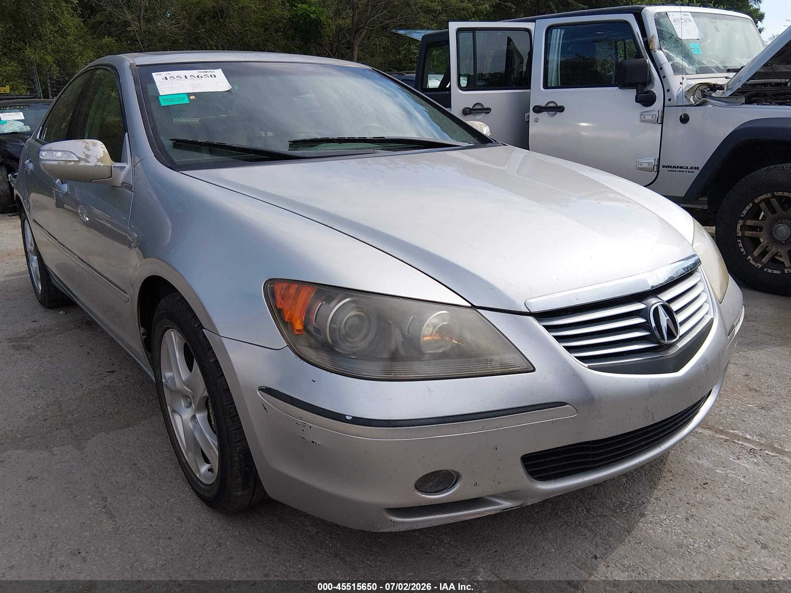 2006 Acura RL, VIN JH4KB16556C005163 — Зад