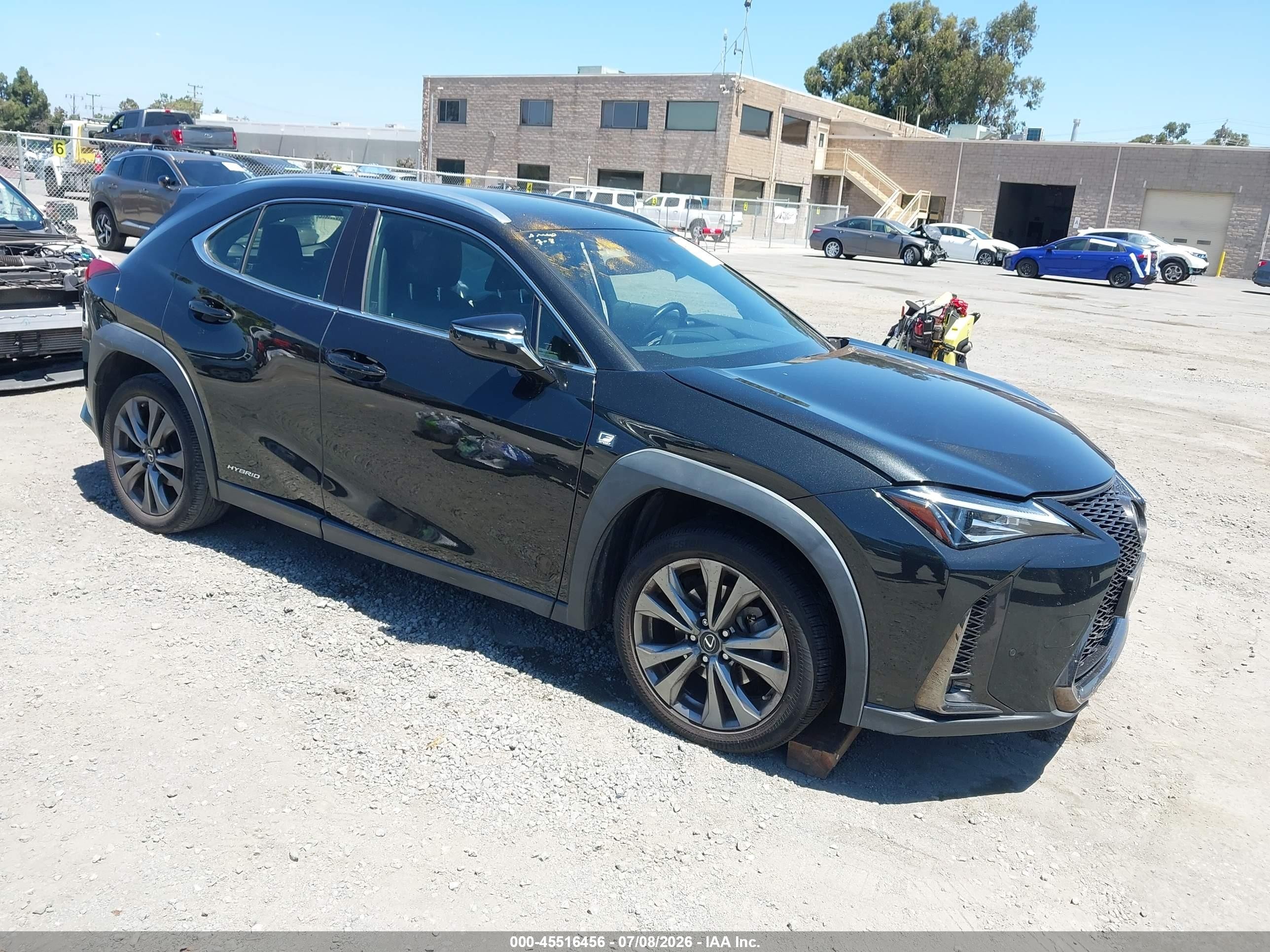 2021 Lexus UX 250h F Sport, VIN JTHE9JBH0M2049728 — Side