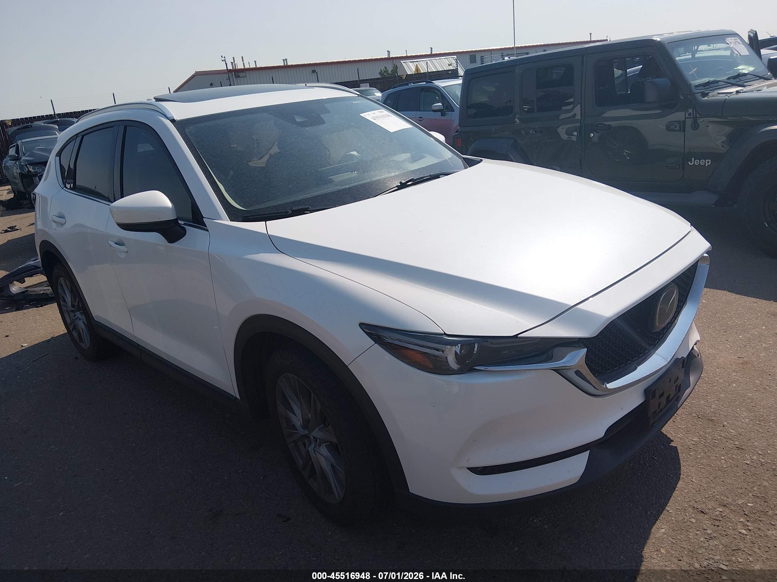 2021 Mazda CX-5 Grand Touring Reserve, VIN JM3KFBAY3M0444686 — Front end