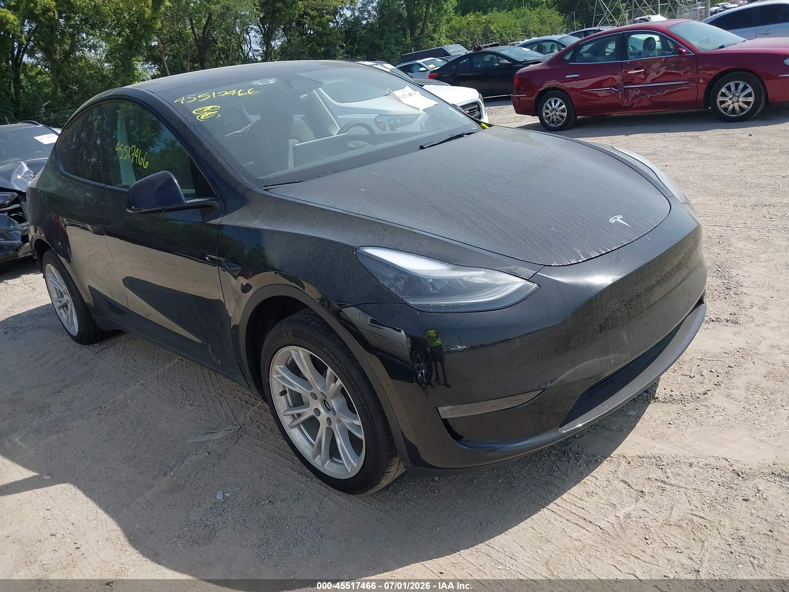 2024 Tesla Model Y Long Range, VIN 7SAYGDEE9RA286665 — Rear end