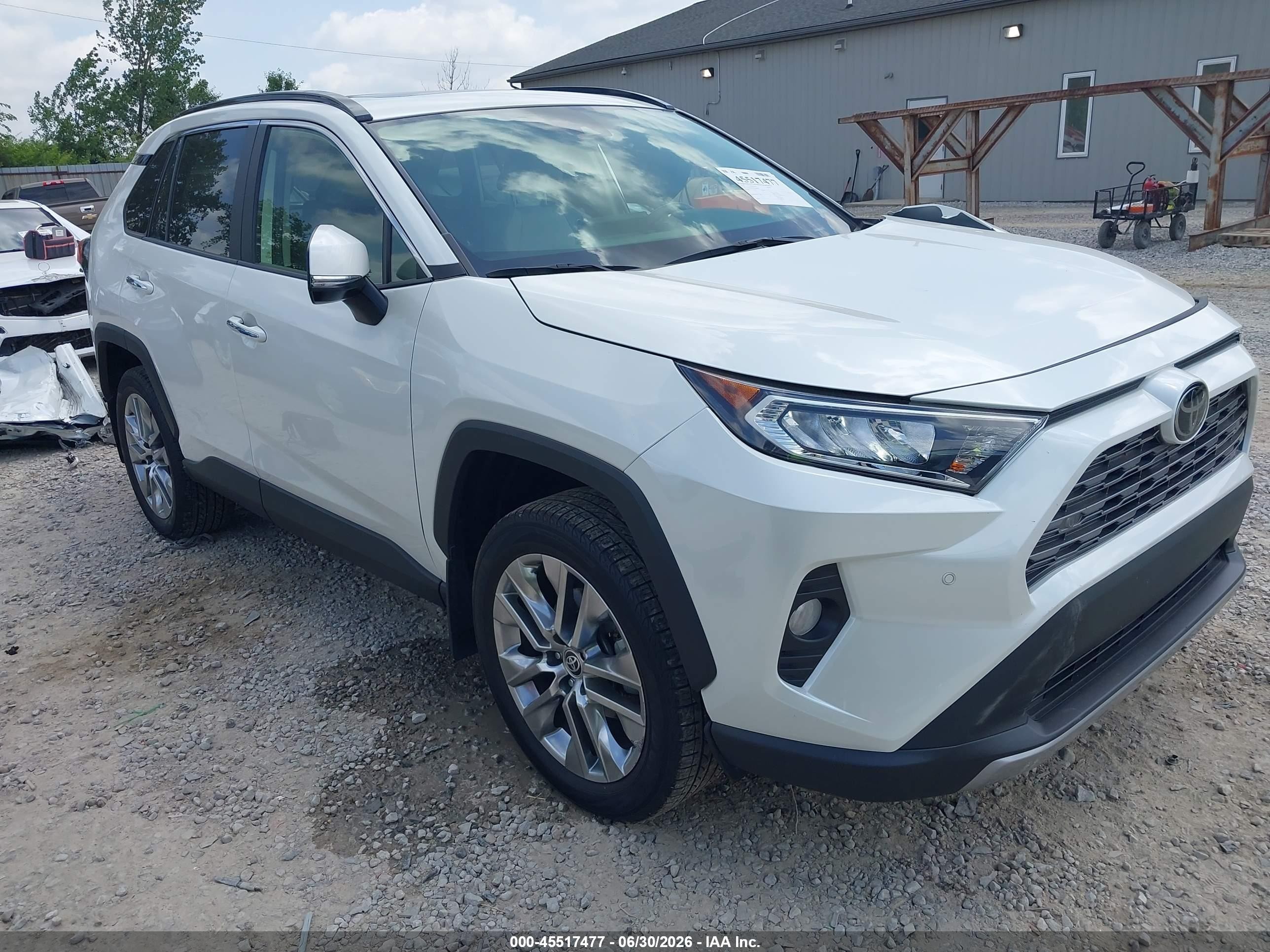 2020 Toyota RAV4 Limited, VIN JTMN1RFV8LD068702 — Side