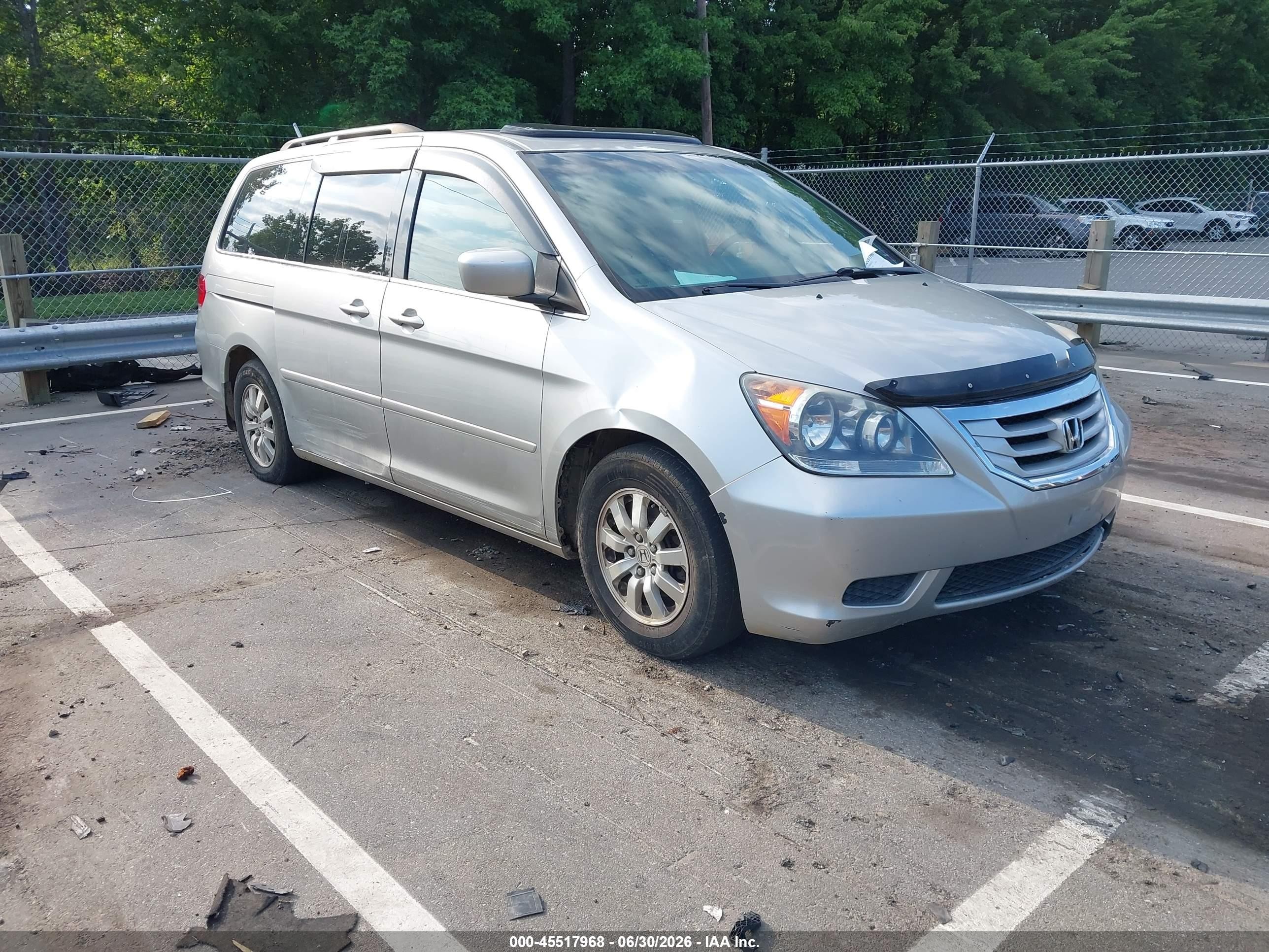 2009 Honda Odyssey EX-L, VIN 5FNRL38789B048930 — Бок