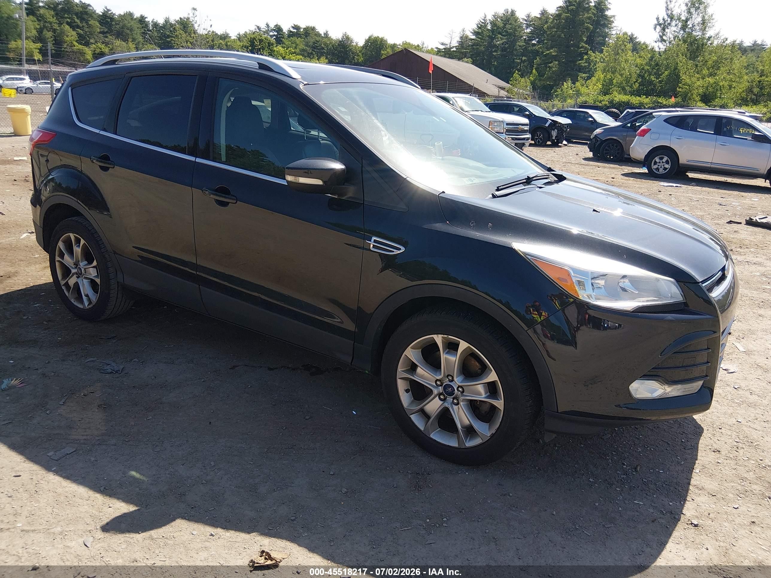 2015 Ford Escape Titanium, VIN 1FMCU9J96FUC84363 — Side