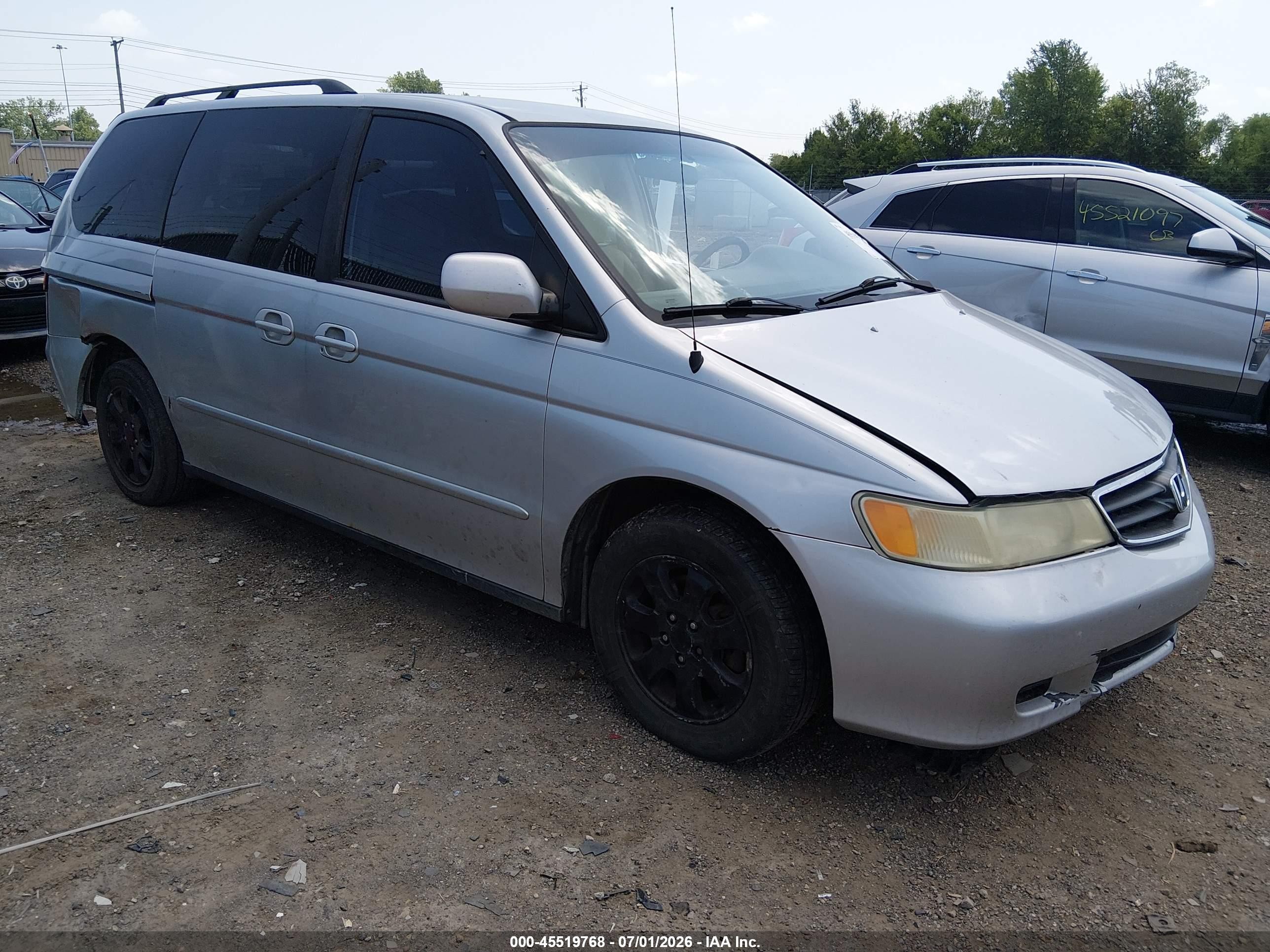 2004 Honda Odyssey EX, VIN 5FNRL18604B053947 — Side