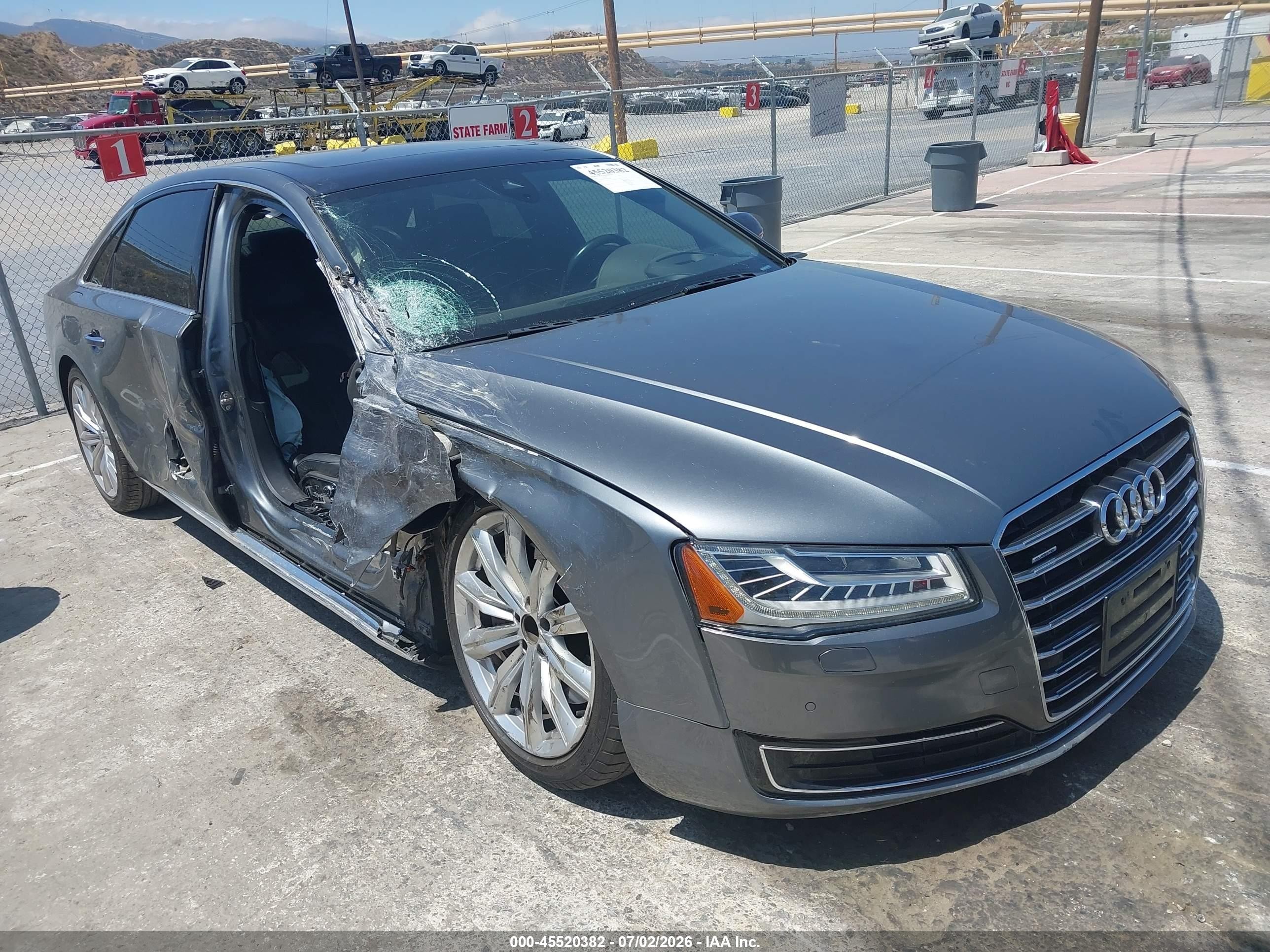 2016 Audi A8 3.0T, VIN WAU34AFD7GN006468 — Side