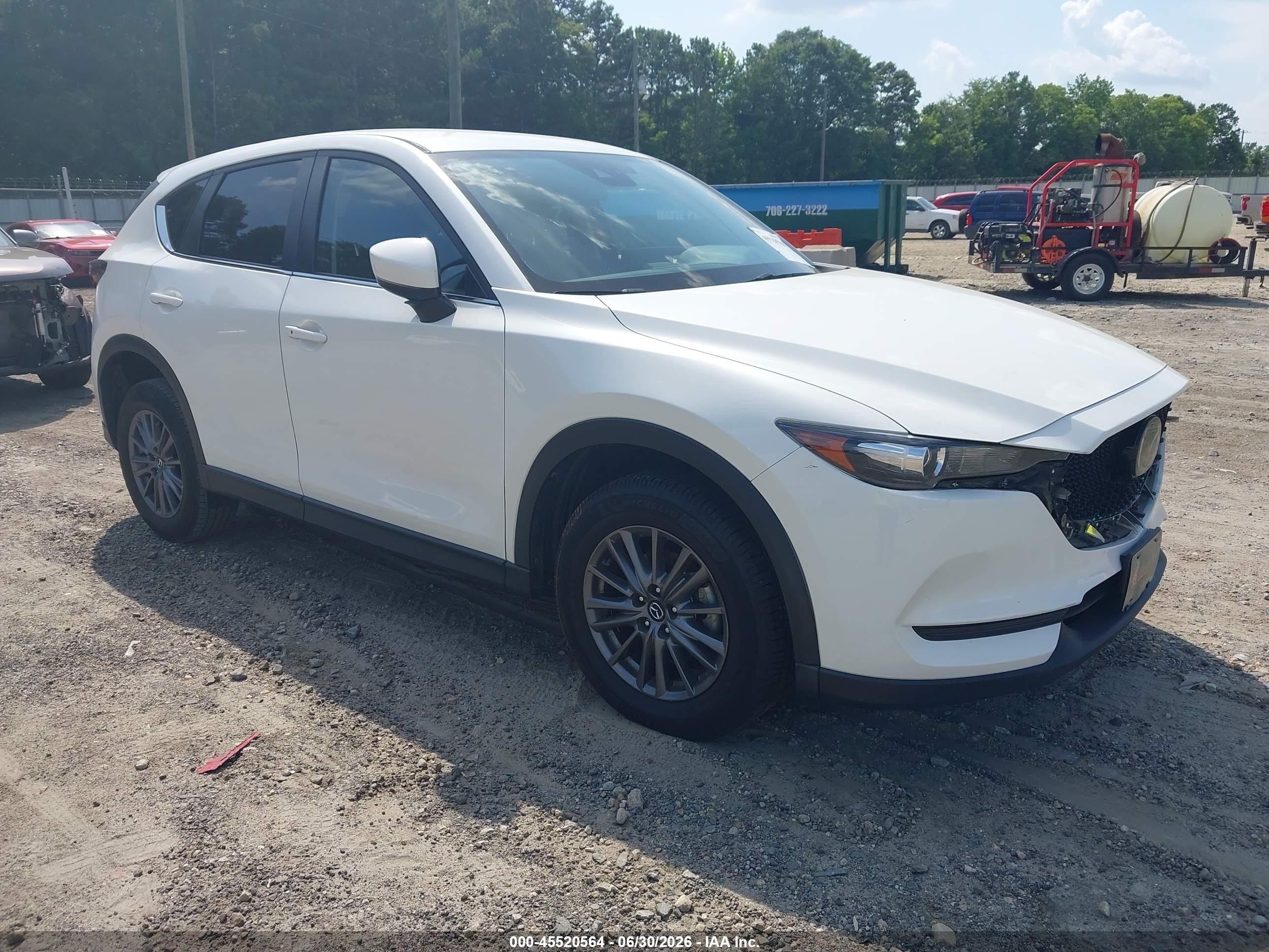 2021 Mazda CX-5 Touring, VIN JM3KFACM4M0319796 — Rear end