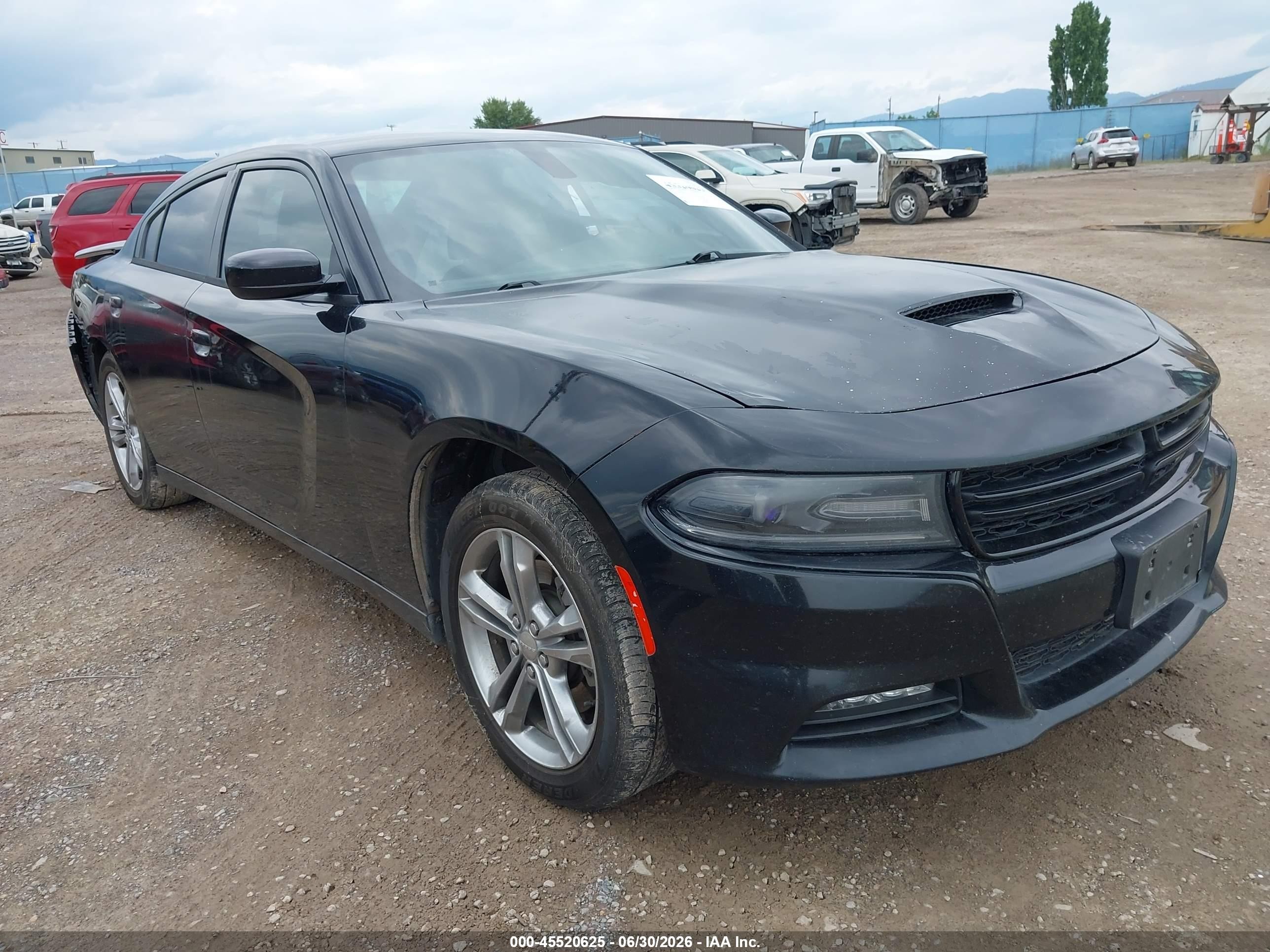 2015 Dodge Charger SE, VIN 2C3CDXFG8FH810354 — Side
