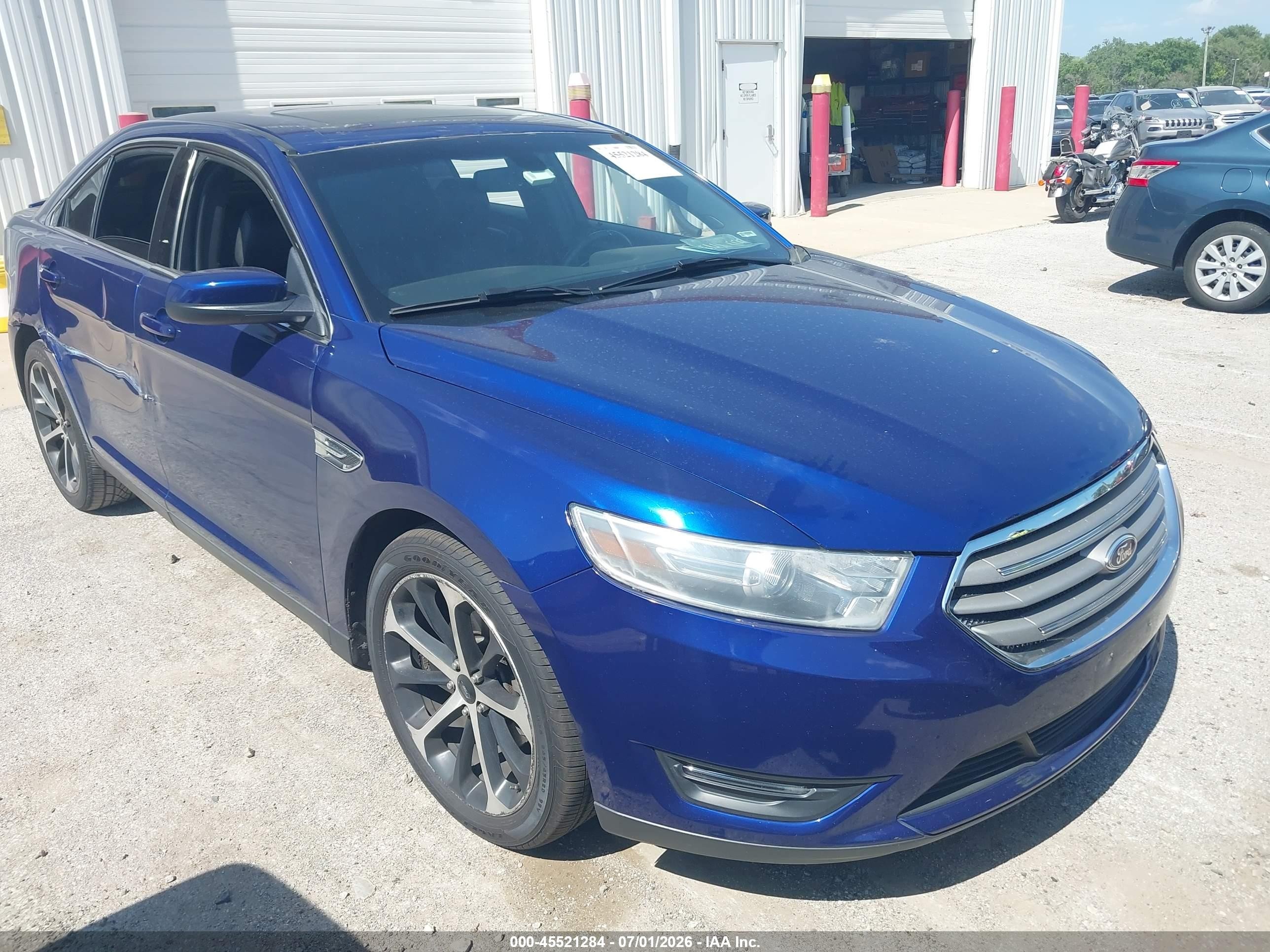 2014 Ford Taurus SEL, VIN 1FAHP2E89EG171116 — Бок
