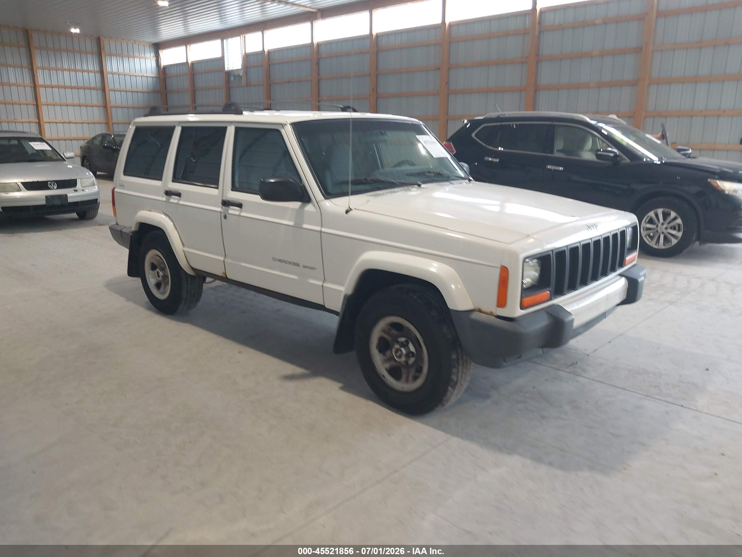 1999 Jeep Cherokee Sport, VIN 1J4FF68S7XL561087 — Normal wear