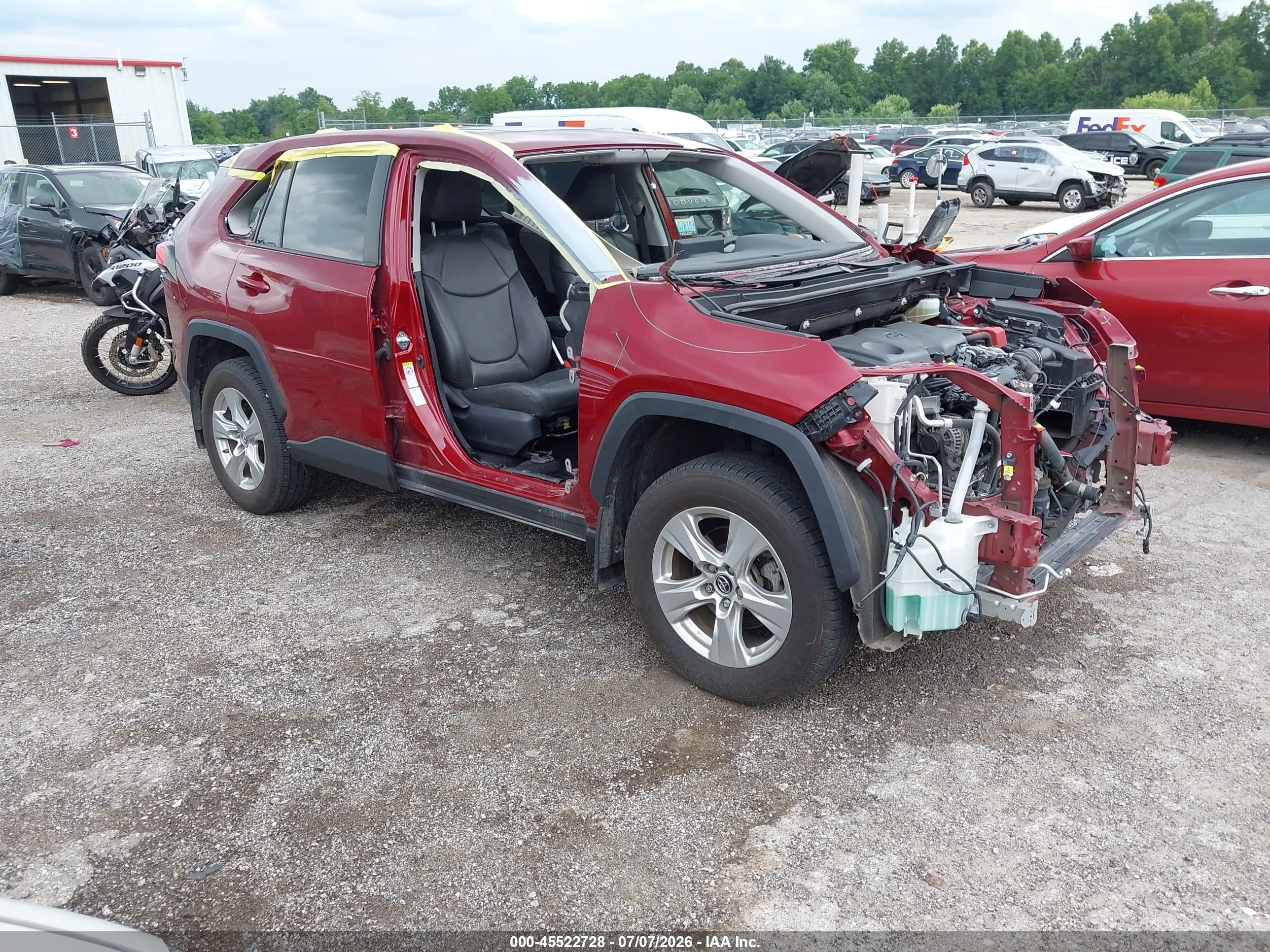 2019 Toyota RAV4 XLE, VIN JTMP1RFV2KD515726 — Rear end