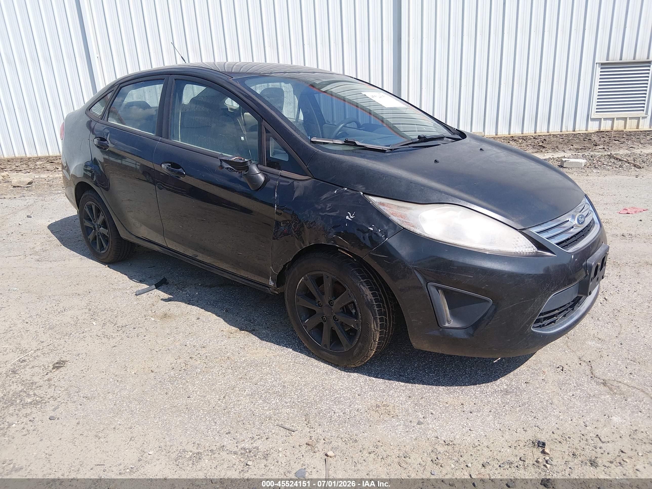 2011 Ford Fiesta SE, VIN 3FADP4BJ1BM170366 — Normal wear