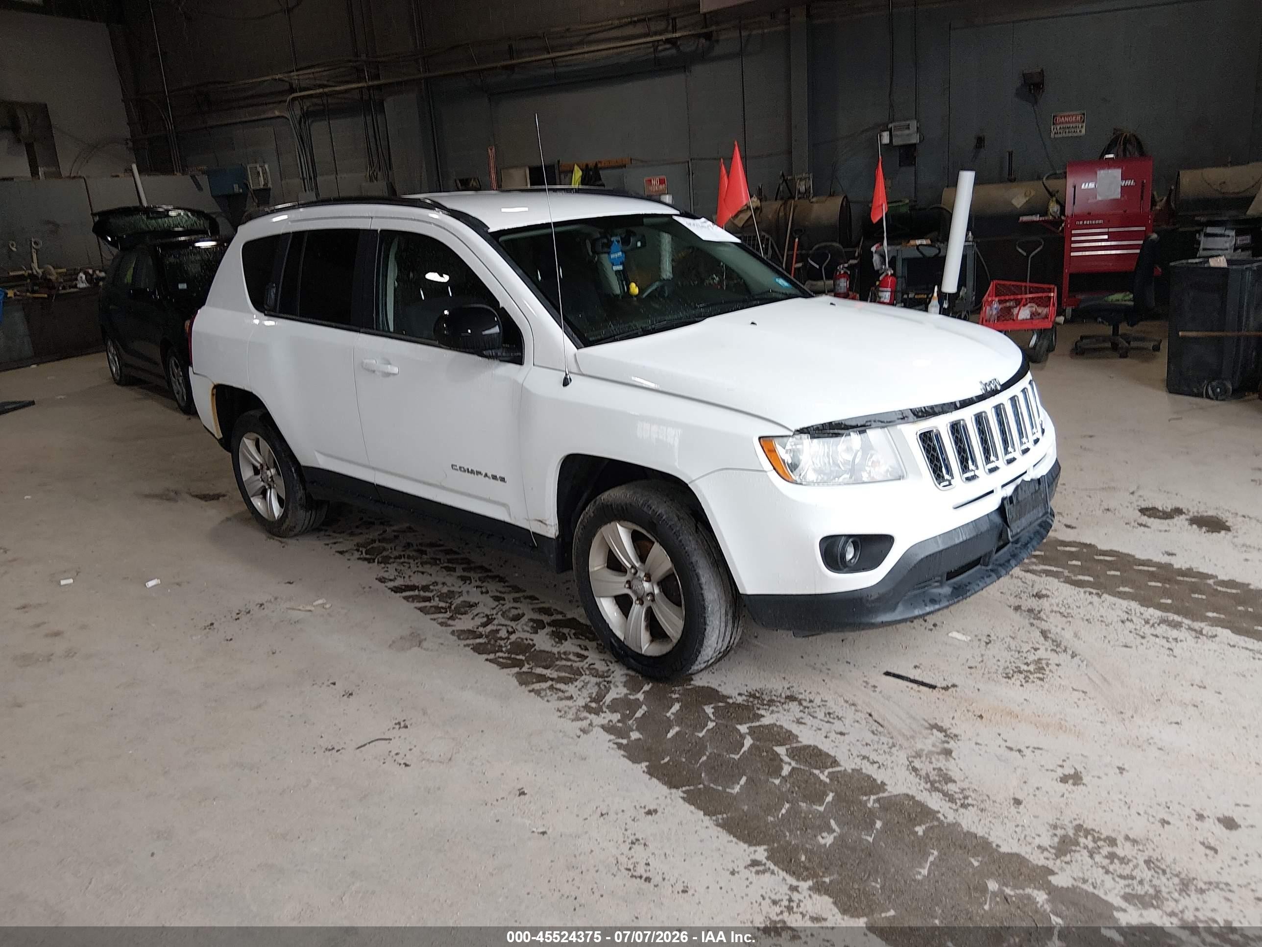 2013 Jeep Compass Sport, VIN 1C4NJDBB4DD275099 — Rear end