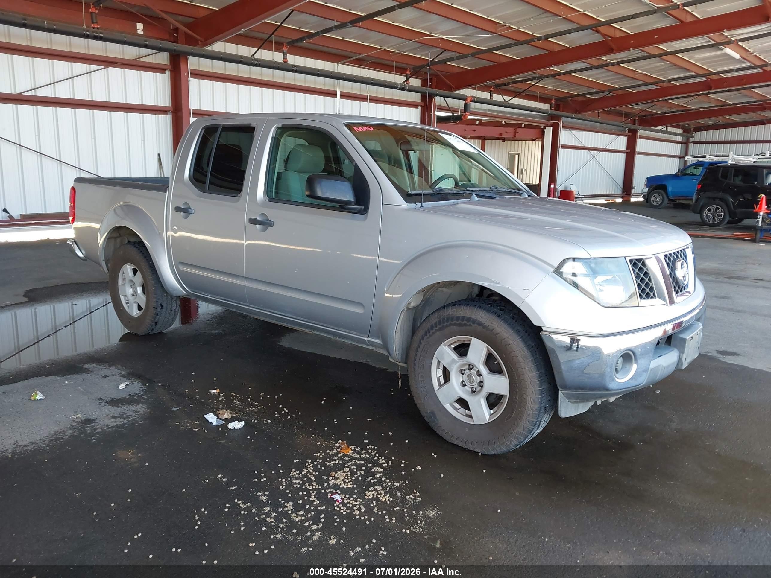 2006 Nissan Frontier SE, VIN 1N6AD07U46C403050 — Side