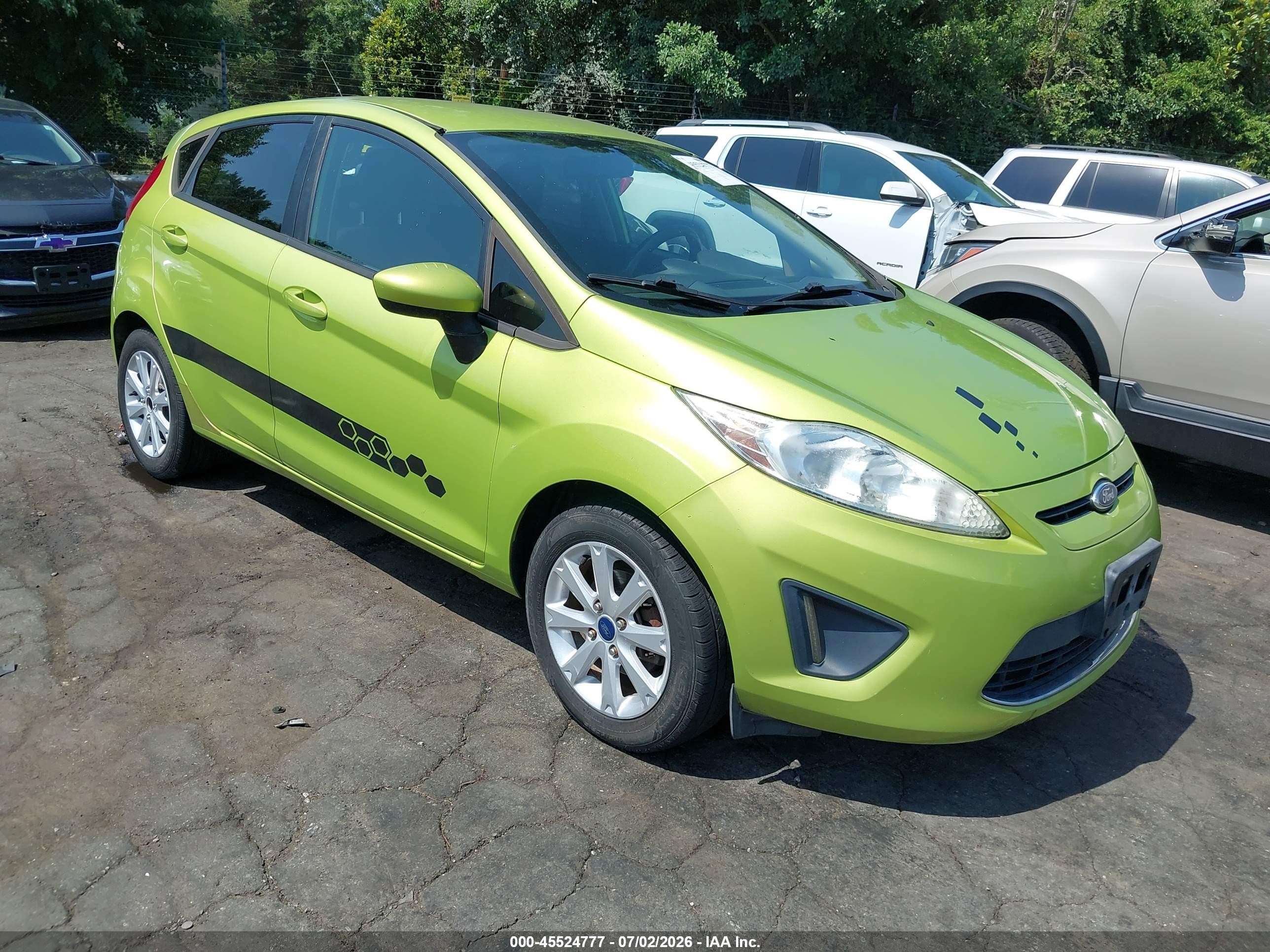 2011 Ford Fiesta SE, VIN 3FADP4EJ9BM185922 — Normal wear