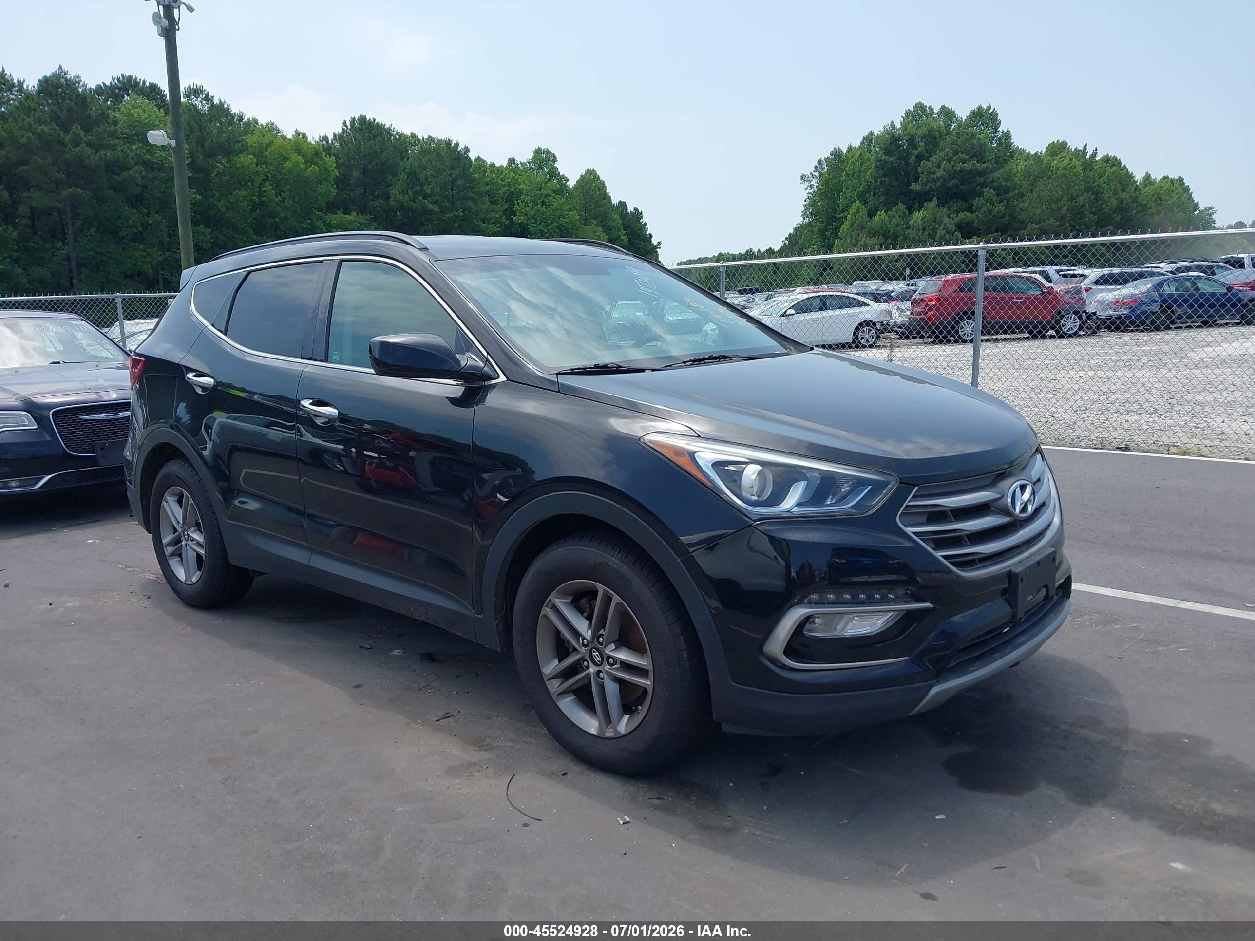 2017 Hyundai Santa Fe 2.4L, VIN 5NMZUDLB1HH030166 — Normal wear