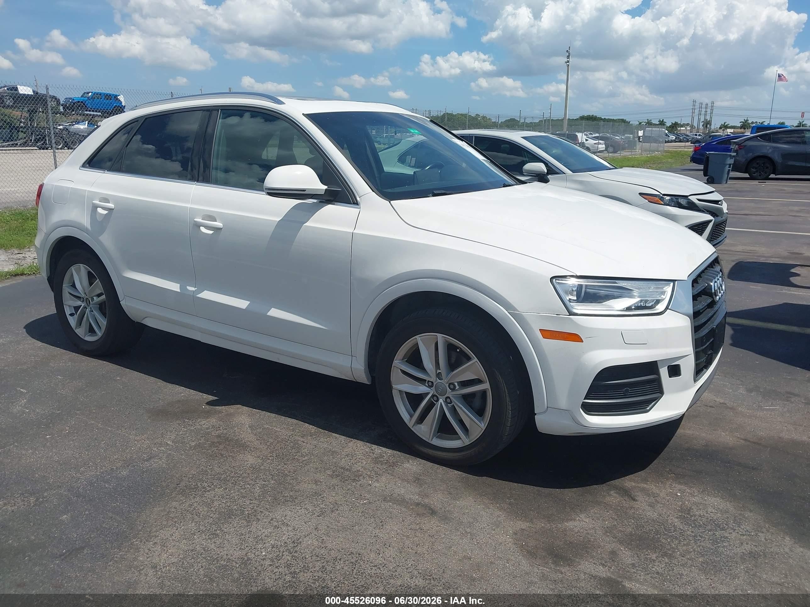 2017 Audi Q3 Premium Plus, VIN WA1JCCFSXHR012471 — Side