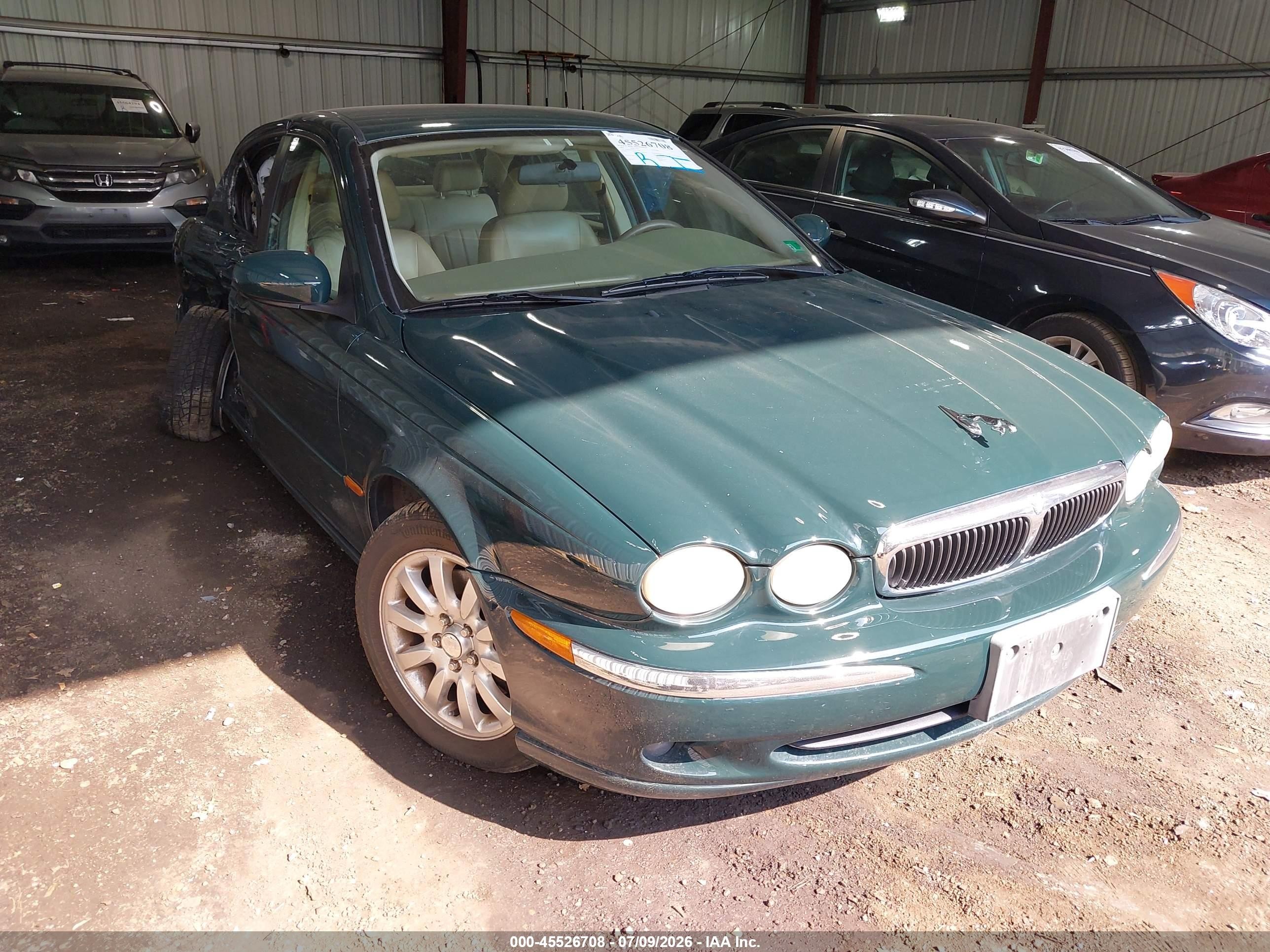 2004 Jaguar X-Type, VIN SAJEB52D94XE17650 — Side