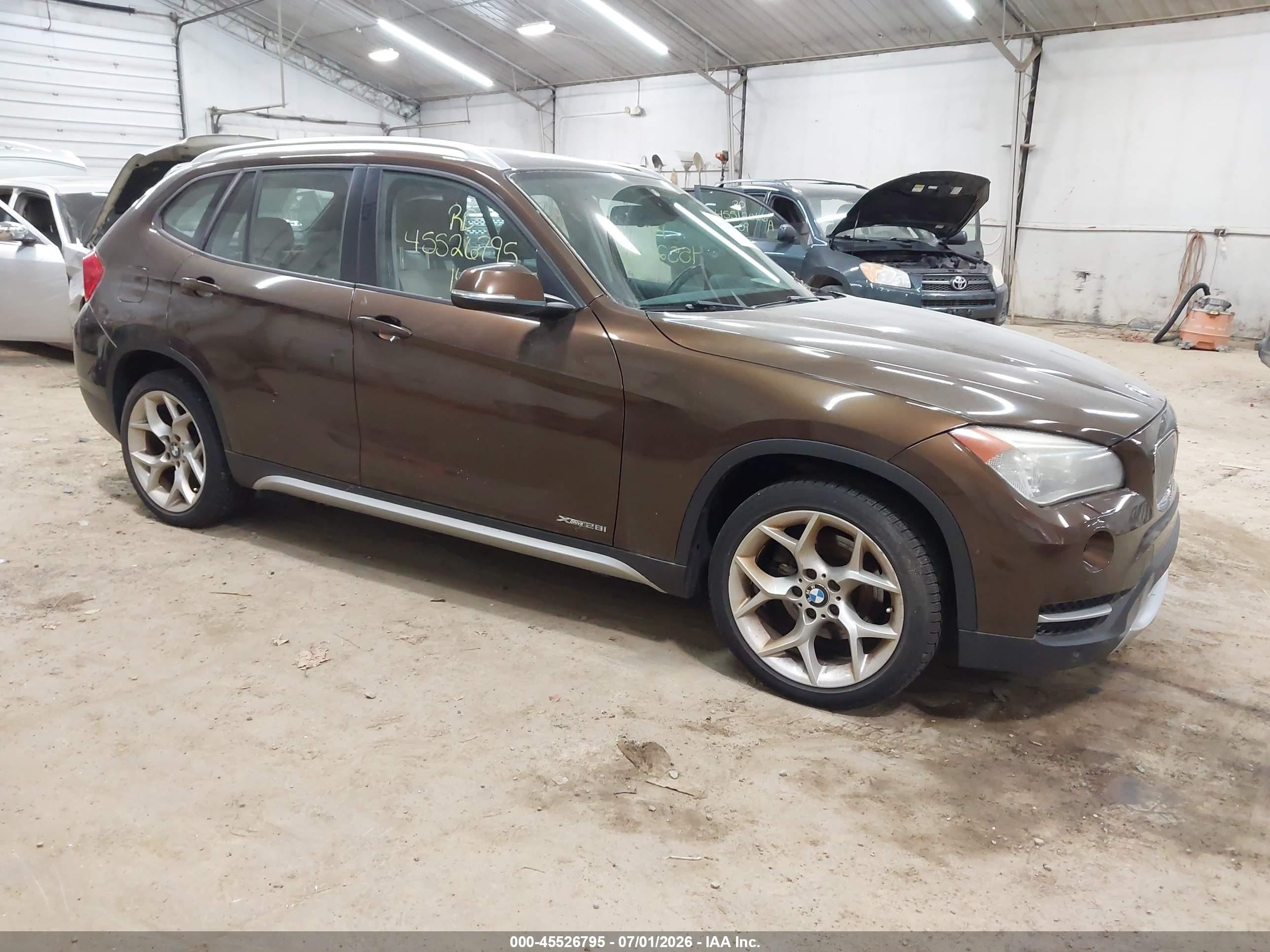2014 BMW X1 xDrive28i, VIN WBAVL1C5XEVY11323 — Normal wear