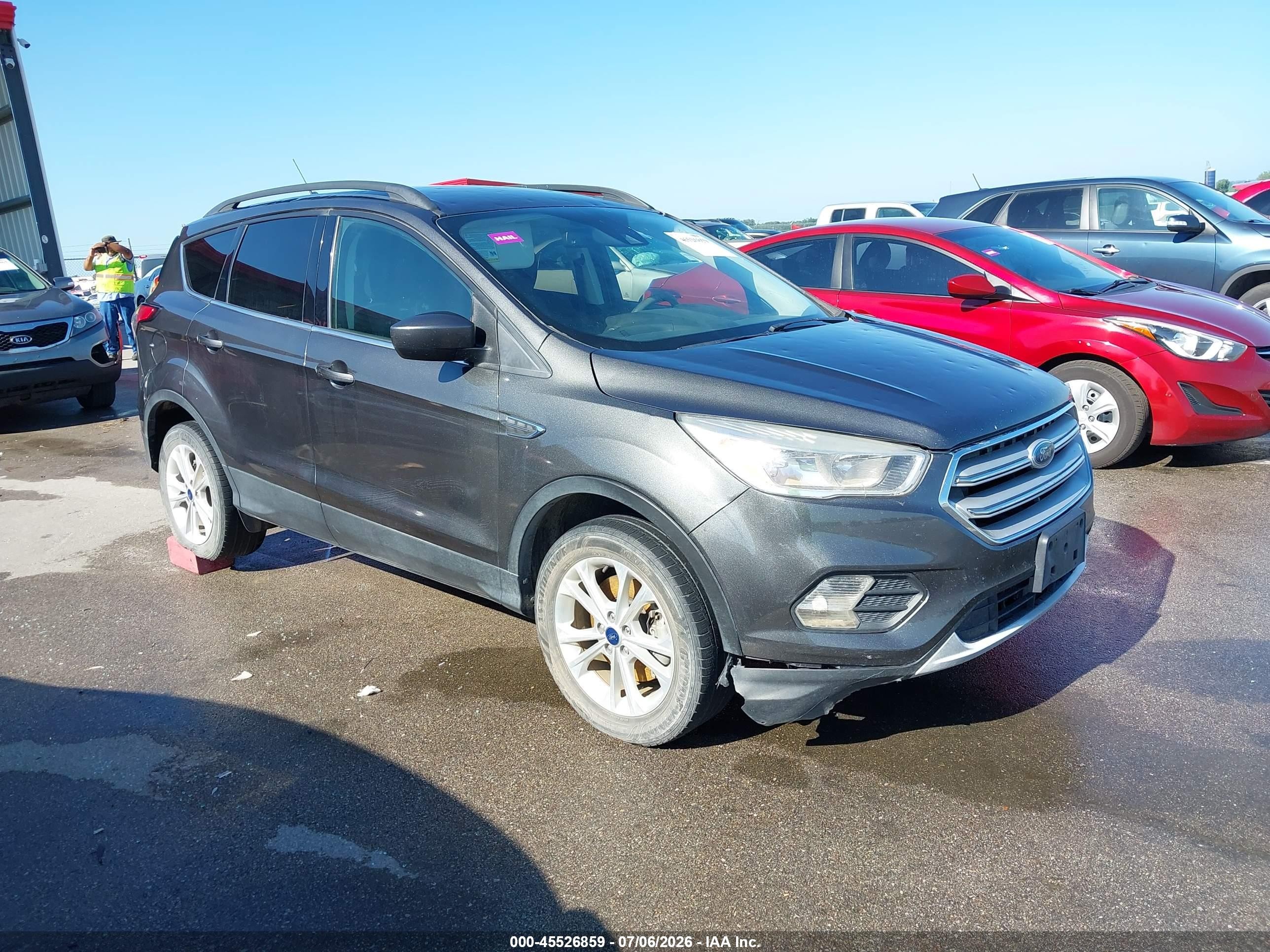 2018 Ford Escape SE, VIN 1FMCU9GD6JUD07726 — Hail