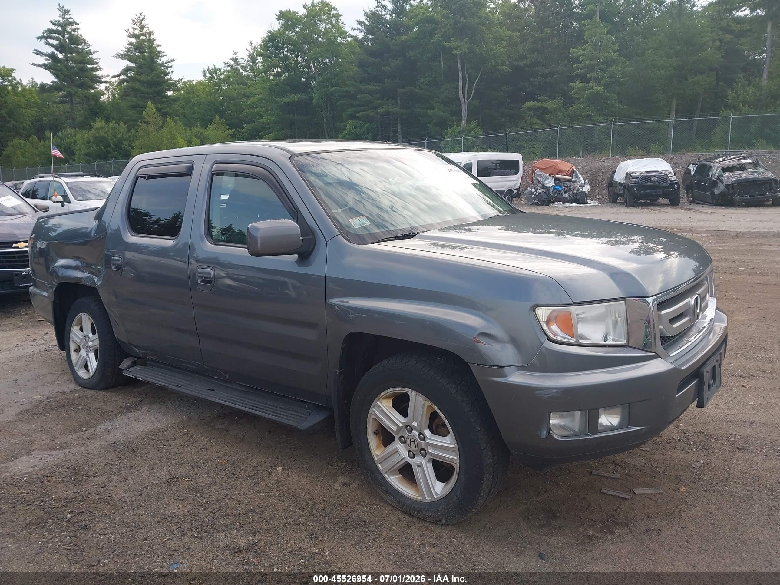 2010 Honda Ridgeline RTL, VIN 5FPYK1F55AB009552 — Side