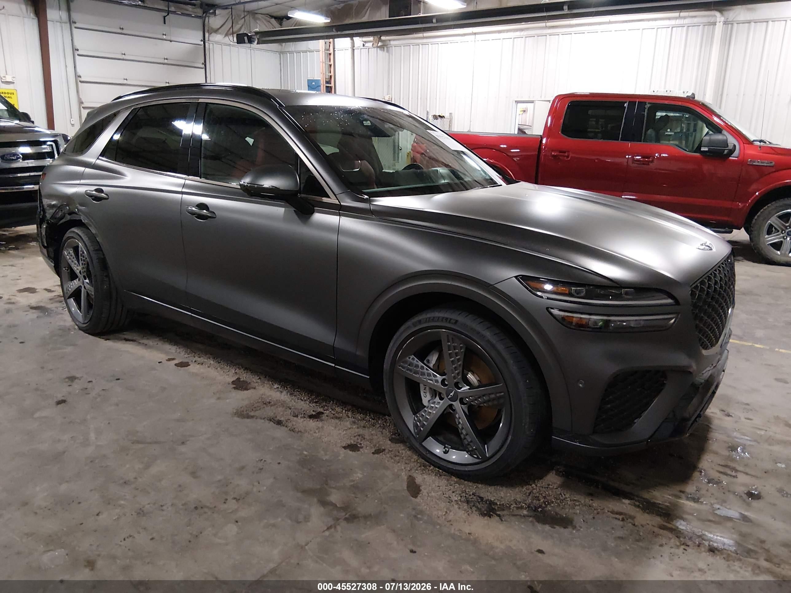 2024 Genesis GV70 2.5T, VIN 5NMMADTB7RH010847 — Rear end