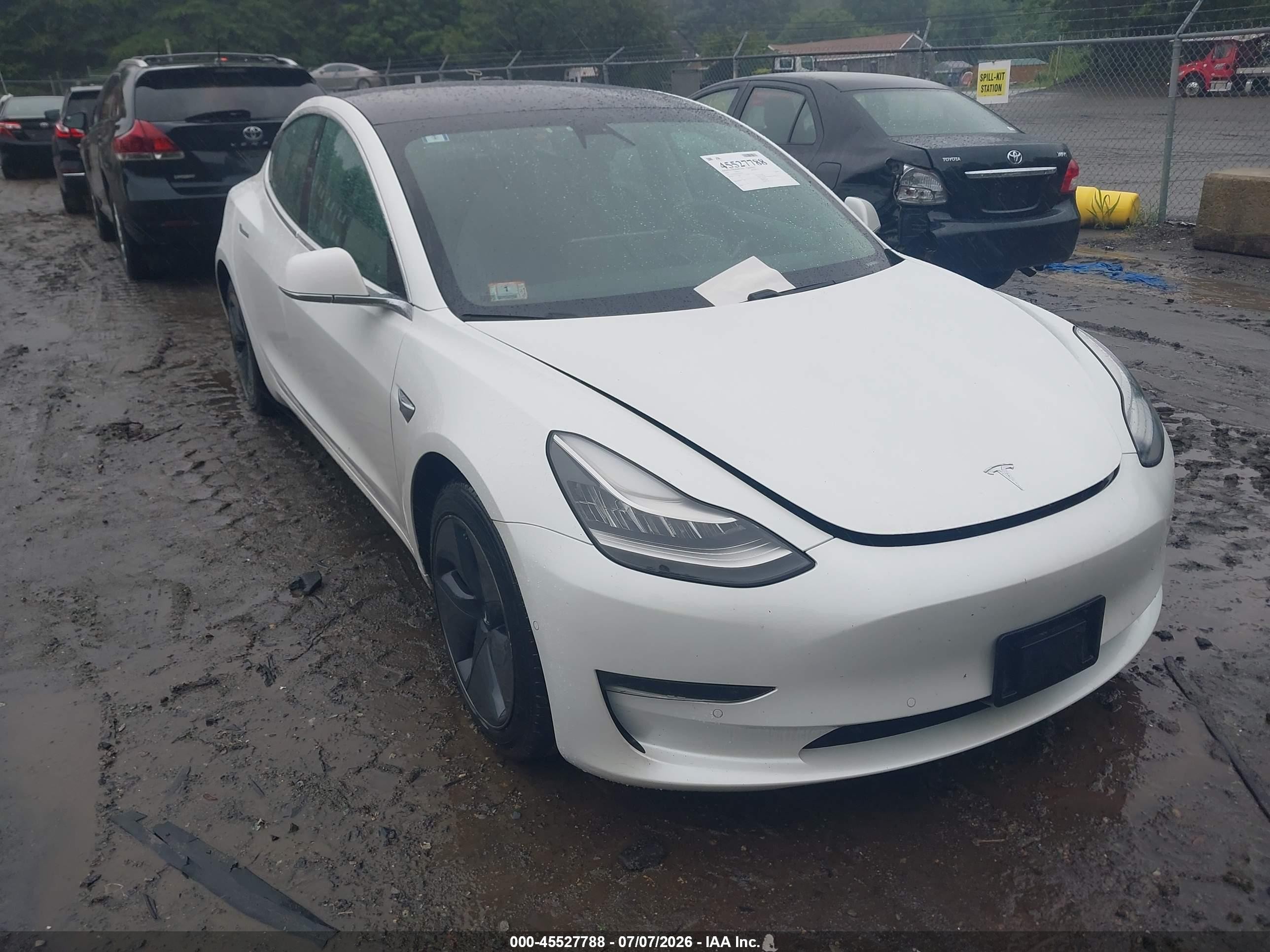 2020 Tesla Model 3 Long Range, VIN 5YJ3E1EB5LF618094 — Rear end