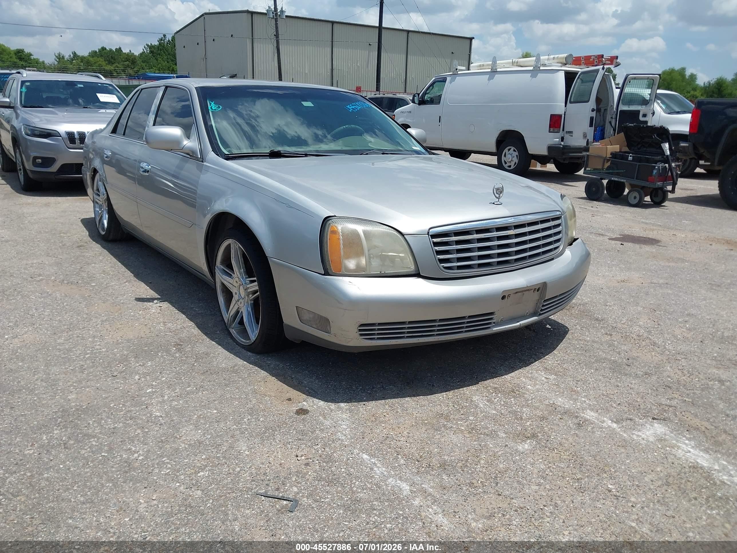 2004 Cadillac DeVille, VIN 1G6KD54Y74U244403 — Normal wear