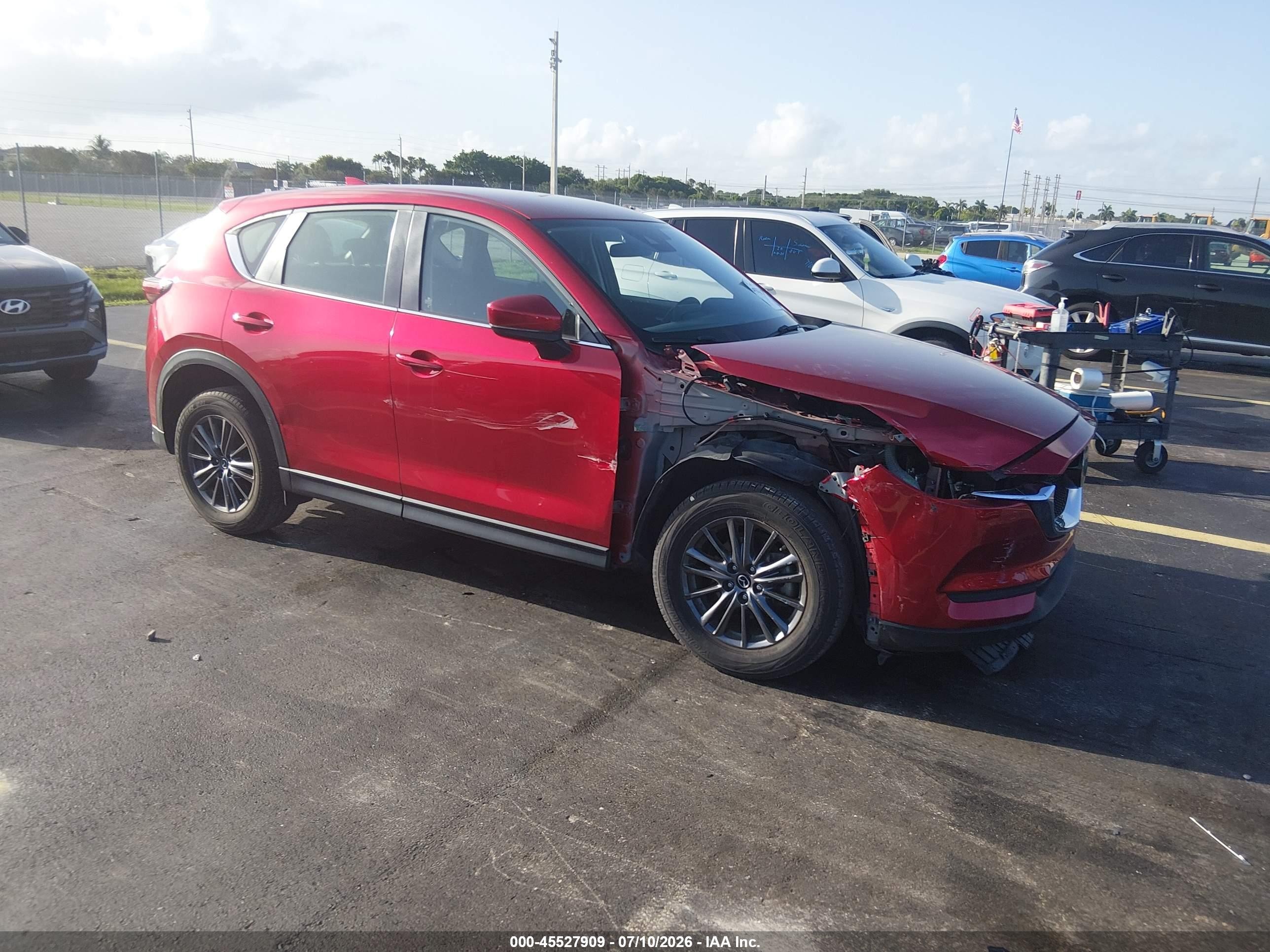 2020 Mazda CX-5 Sport, VIN JM3KFABM8L0777910 — Side