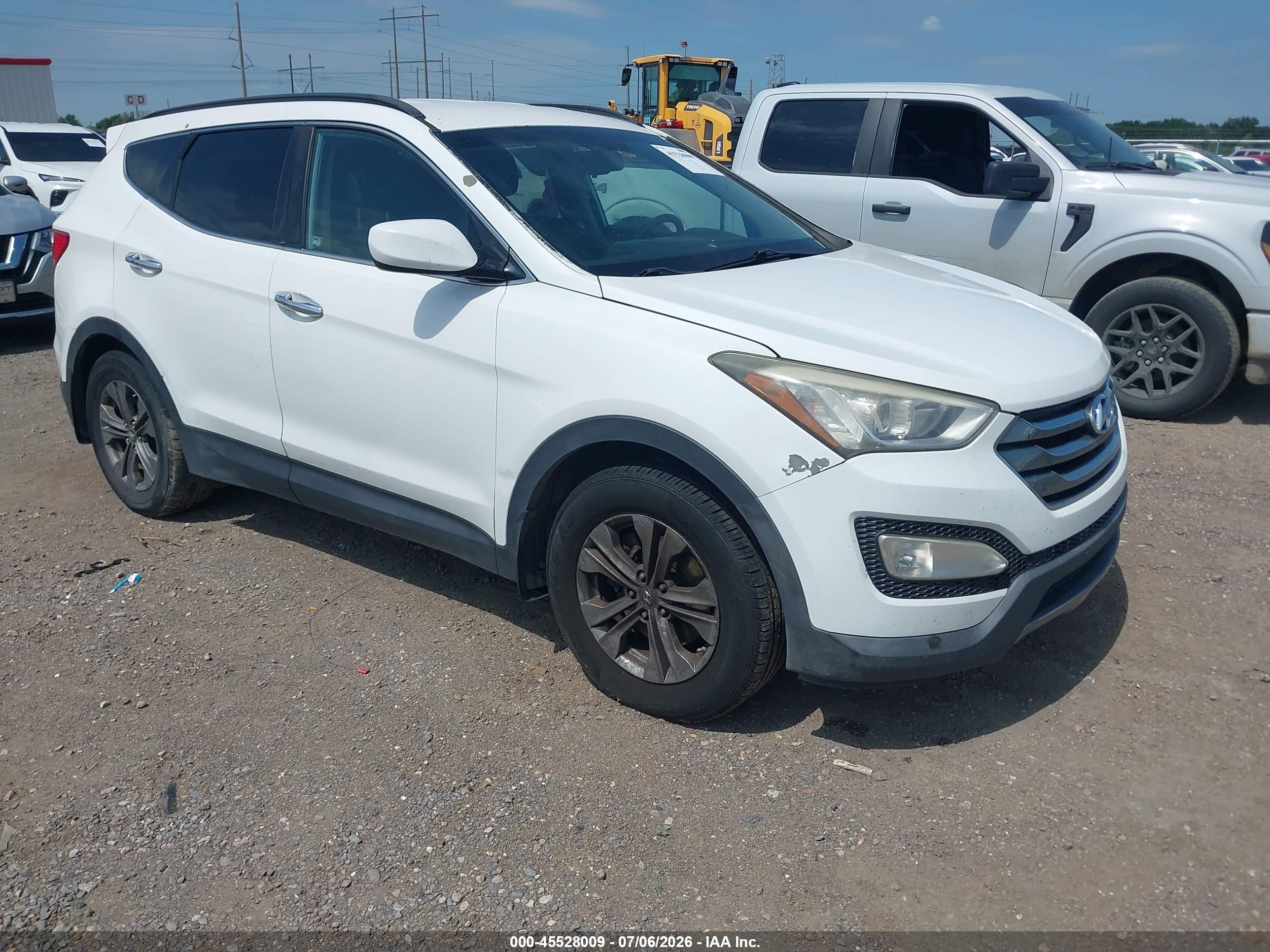 2013 Hyundai Santa Fe Sport, VIN 5XYZU3LBXDG114761 — Rear end