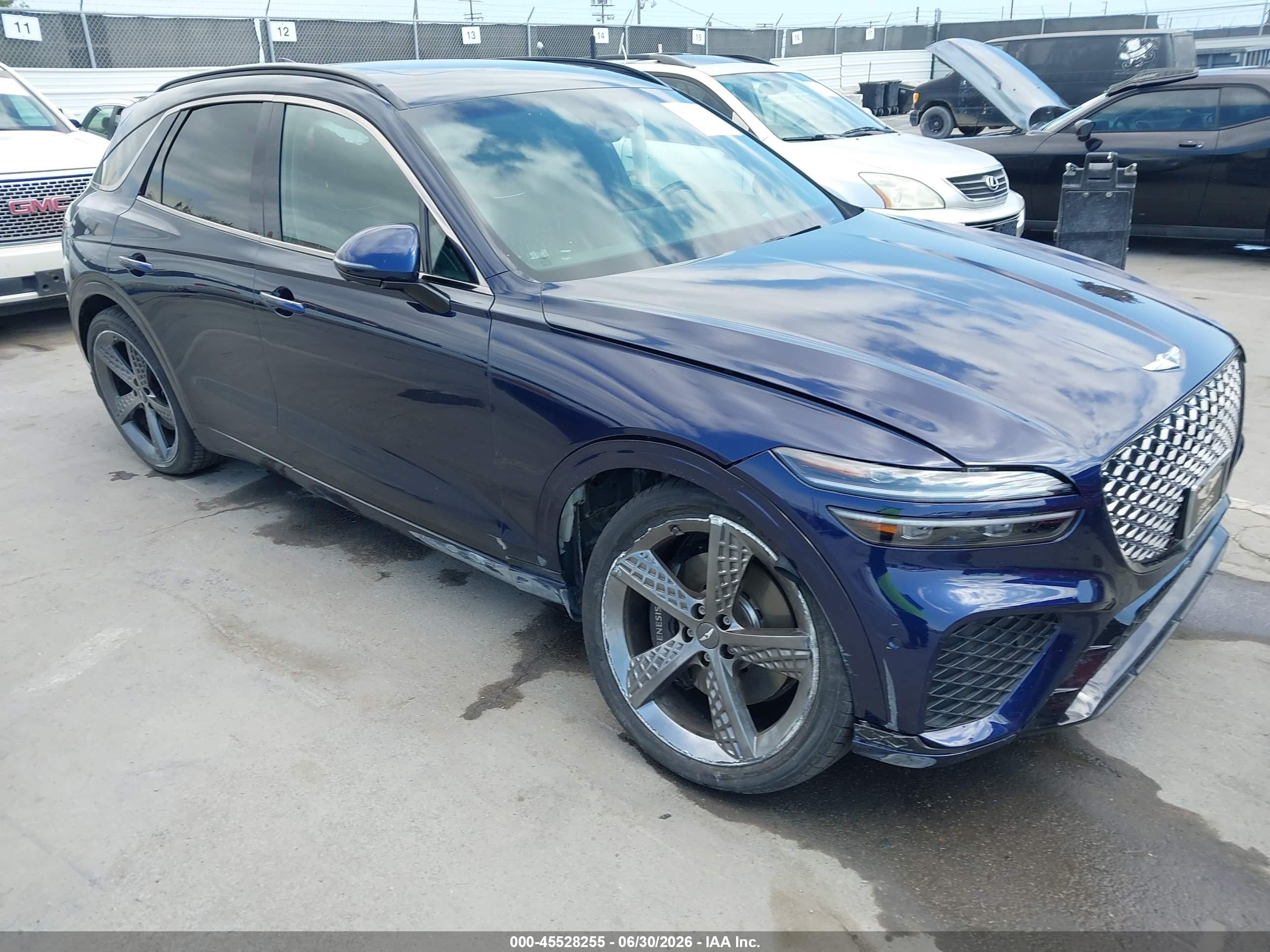 2023 Genesis GV70 Sport, VIN KMUMCDTC5PU104568 — Side