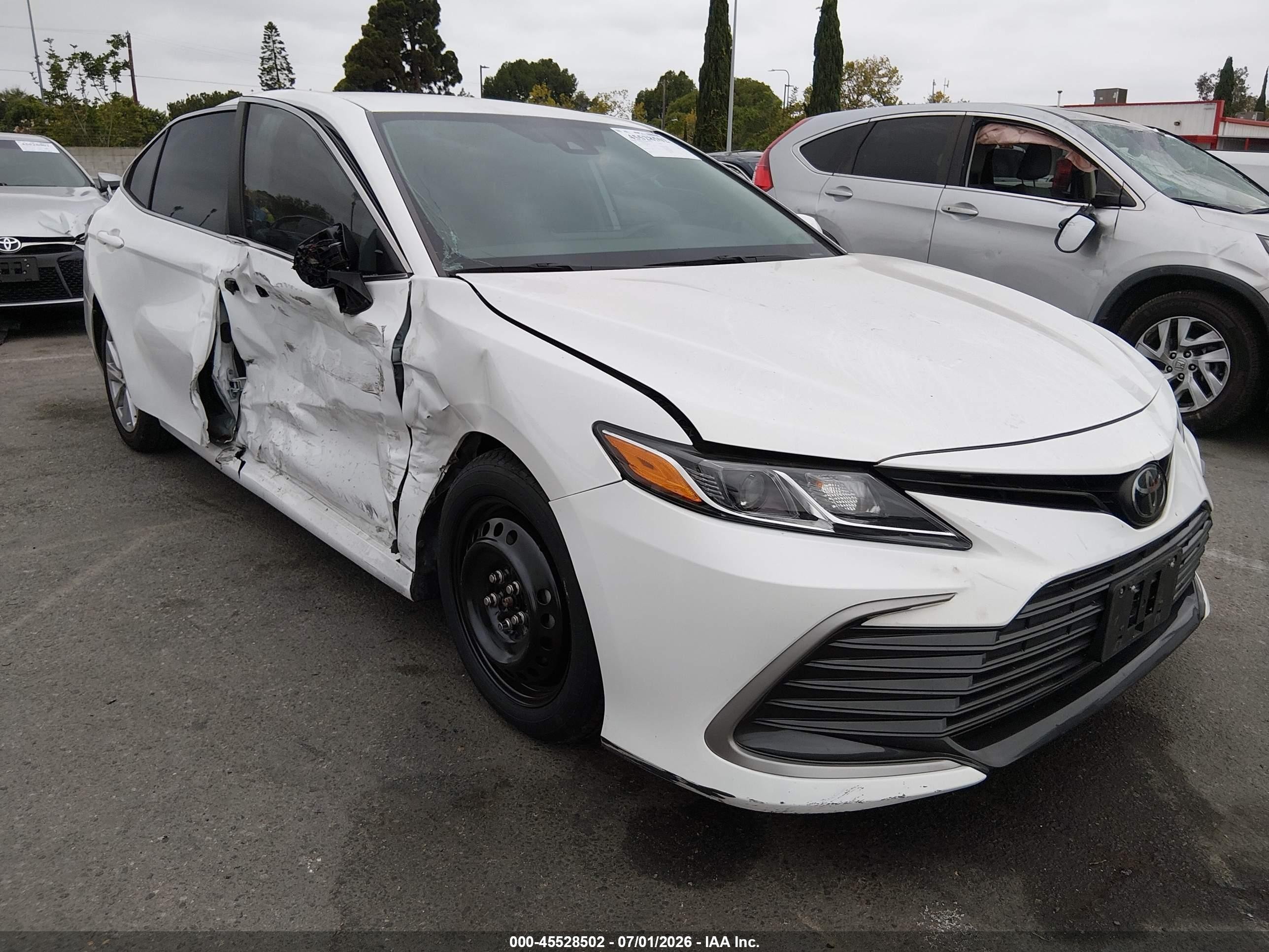 2023 Toyota Camry LE, VIN 4T1C11AK0PU809707 — Side