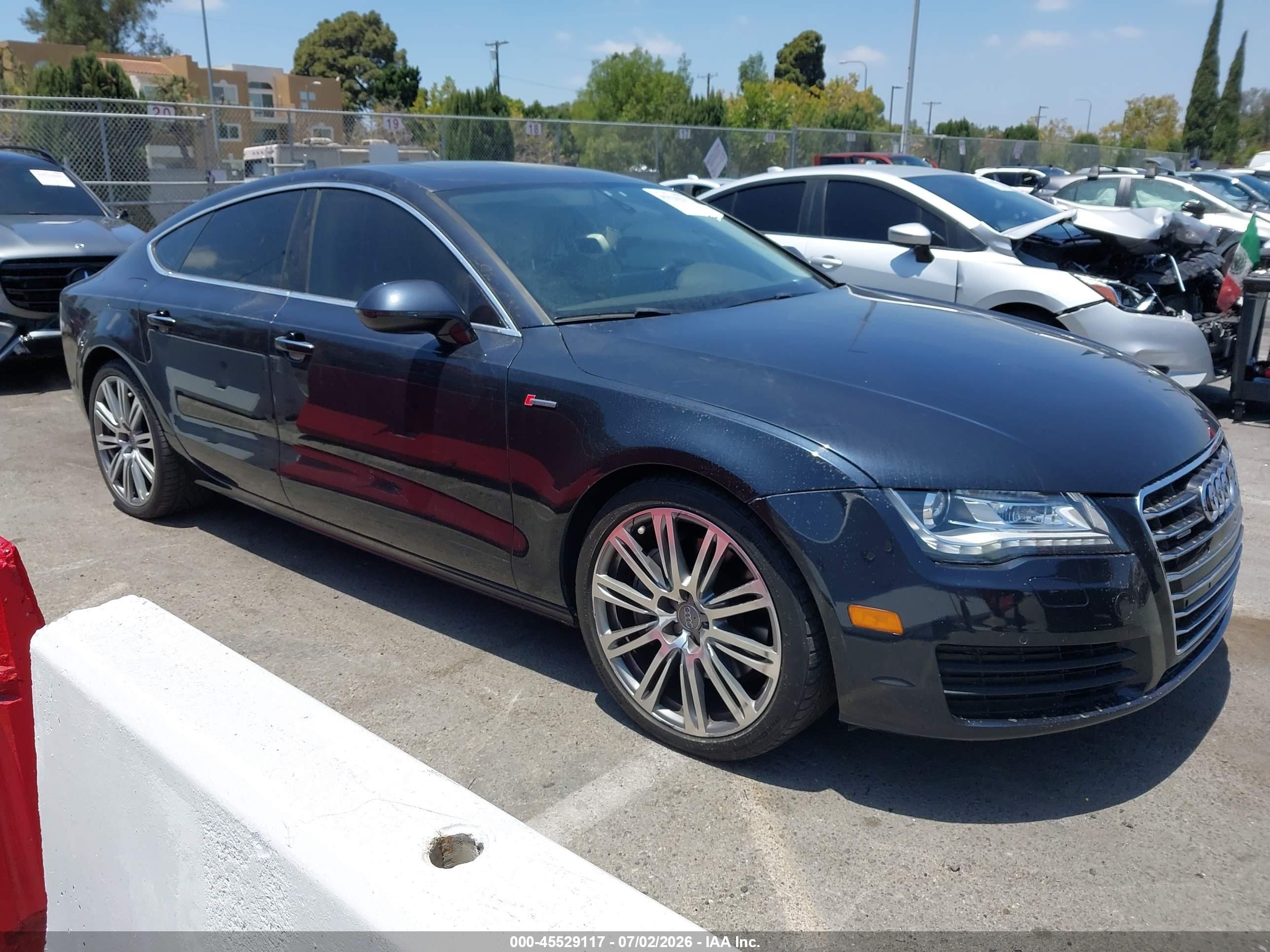 2014 Audi A7 Premium Plus, VIN WAUWGAFC1EN129496 — Side