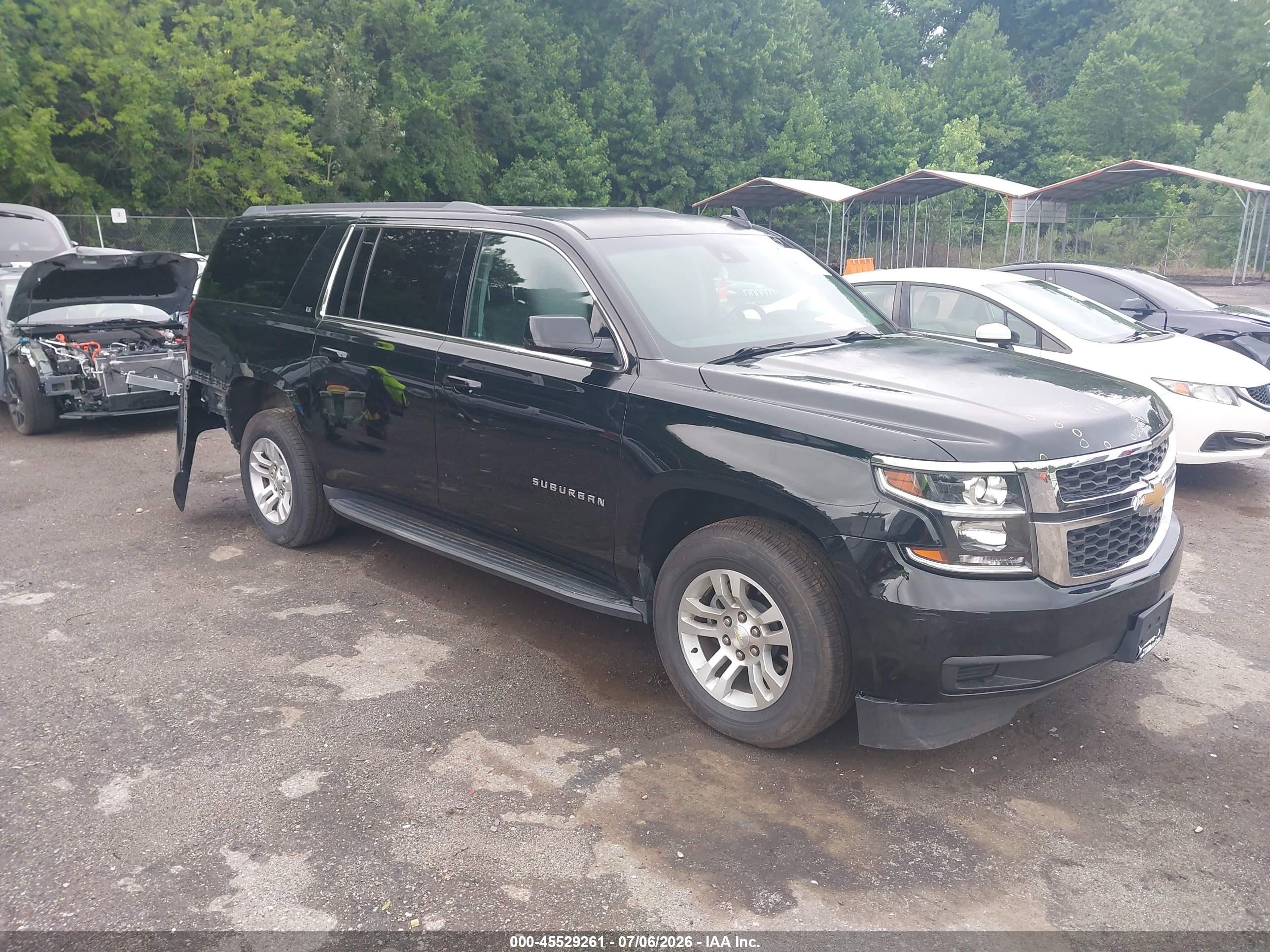 2018 Chevrolet Suburban LT, VIN 1GNSKHKC0JR115162 — Rear end