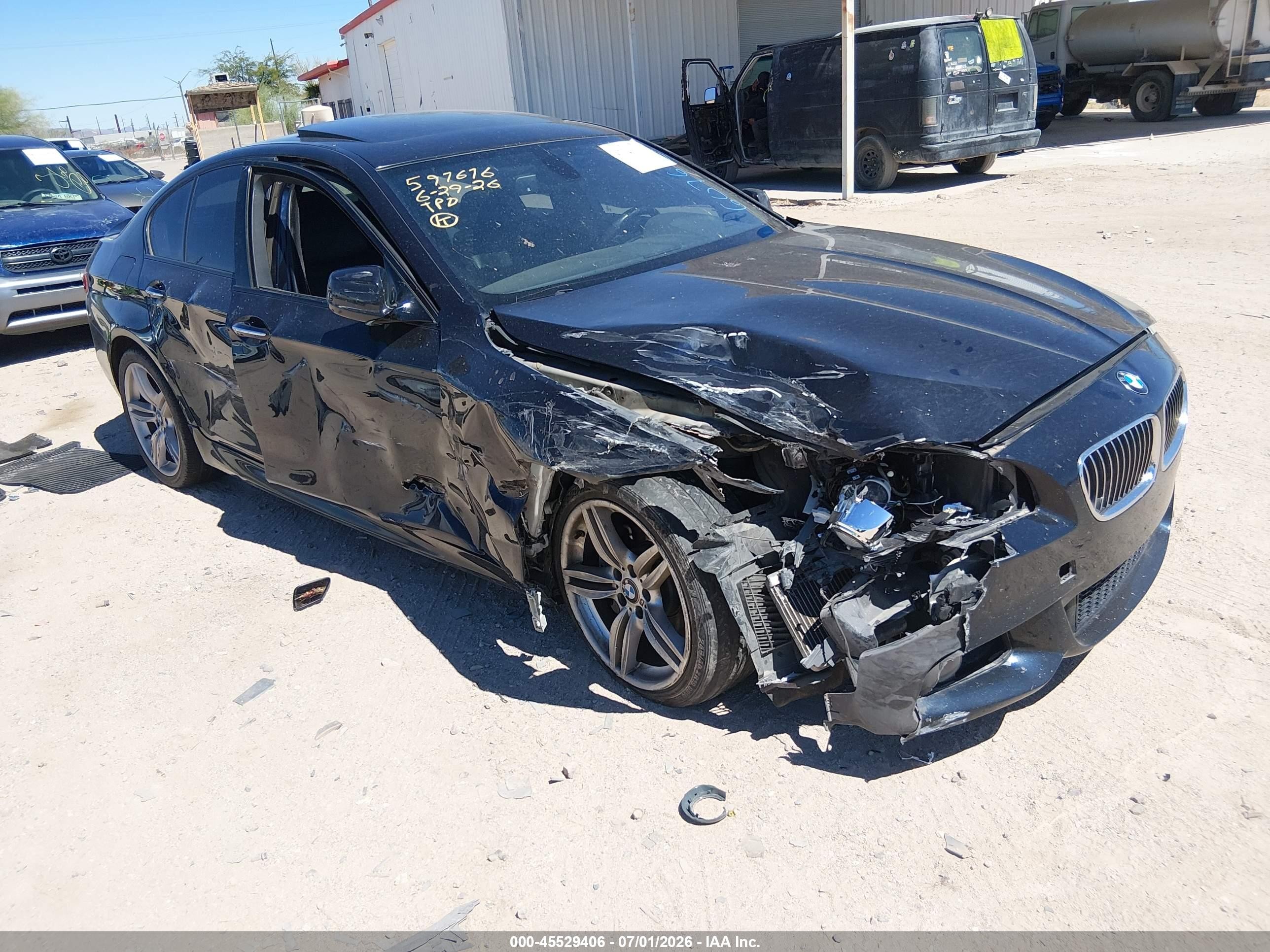 2011 BMW 5 Series 535i, VIN WBAFR7C52BC607693 — Side