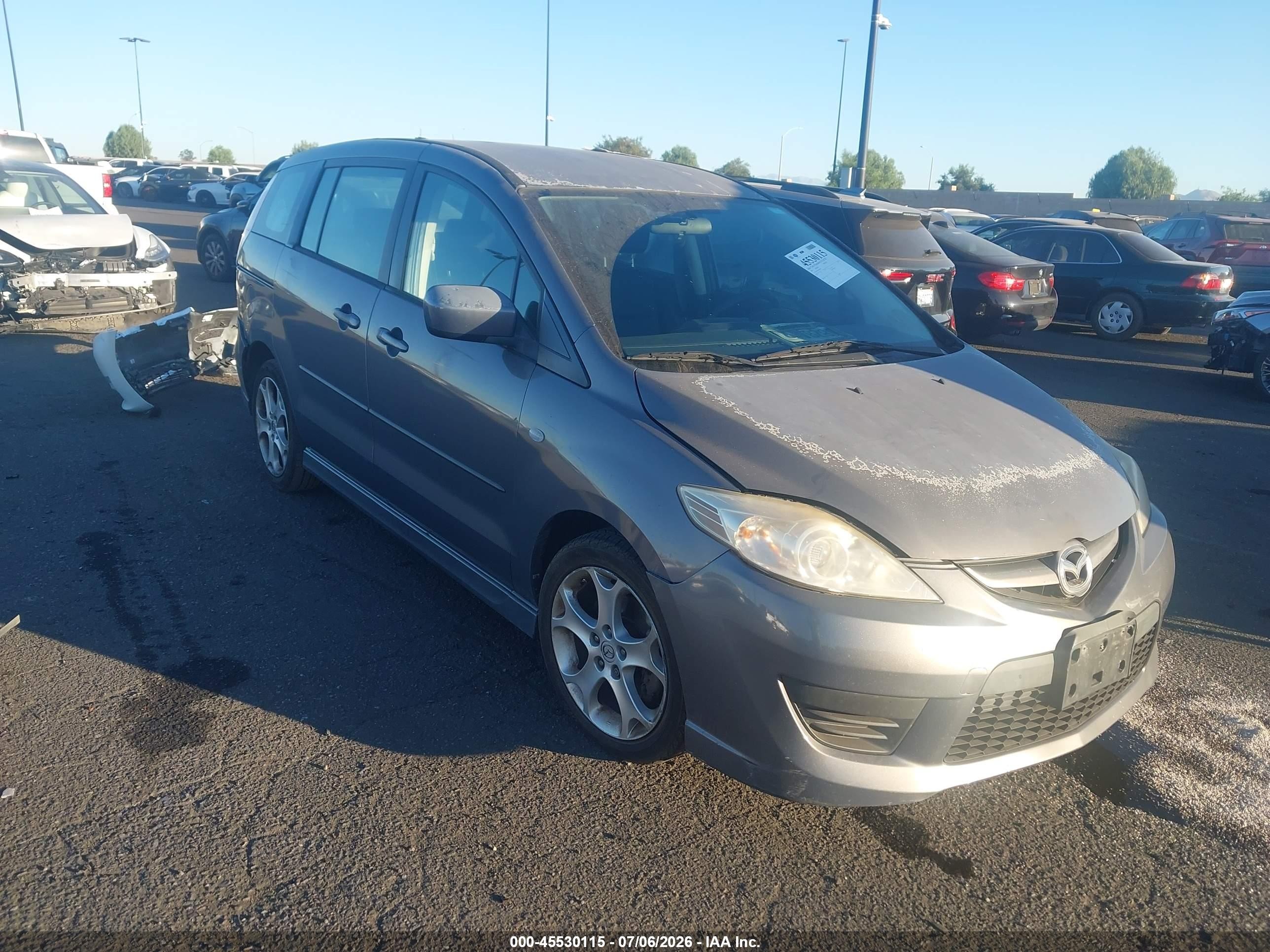 2009 Mazda 5 Touring, VIN JM1CR29L290358550 — Side