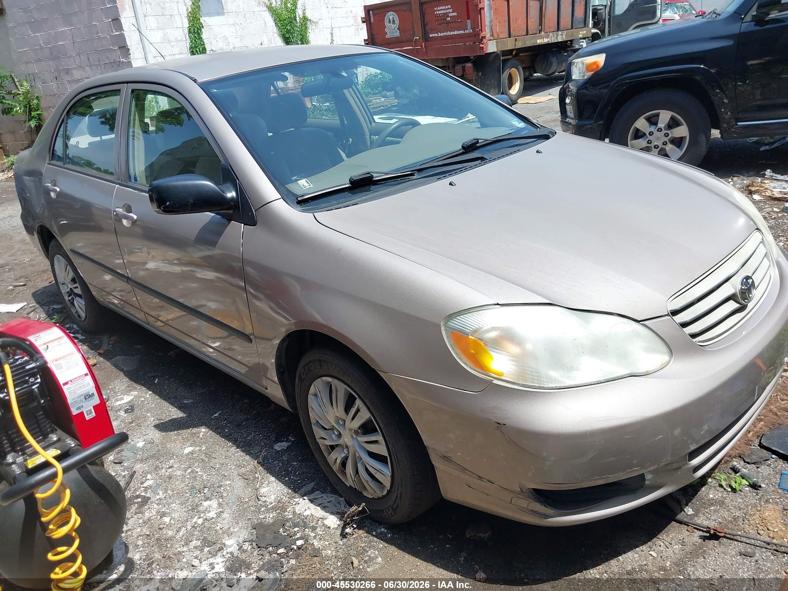 2003 Toyota Corolla CE, VIN 2T1BR32E13C018204 — Side