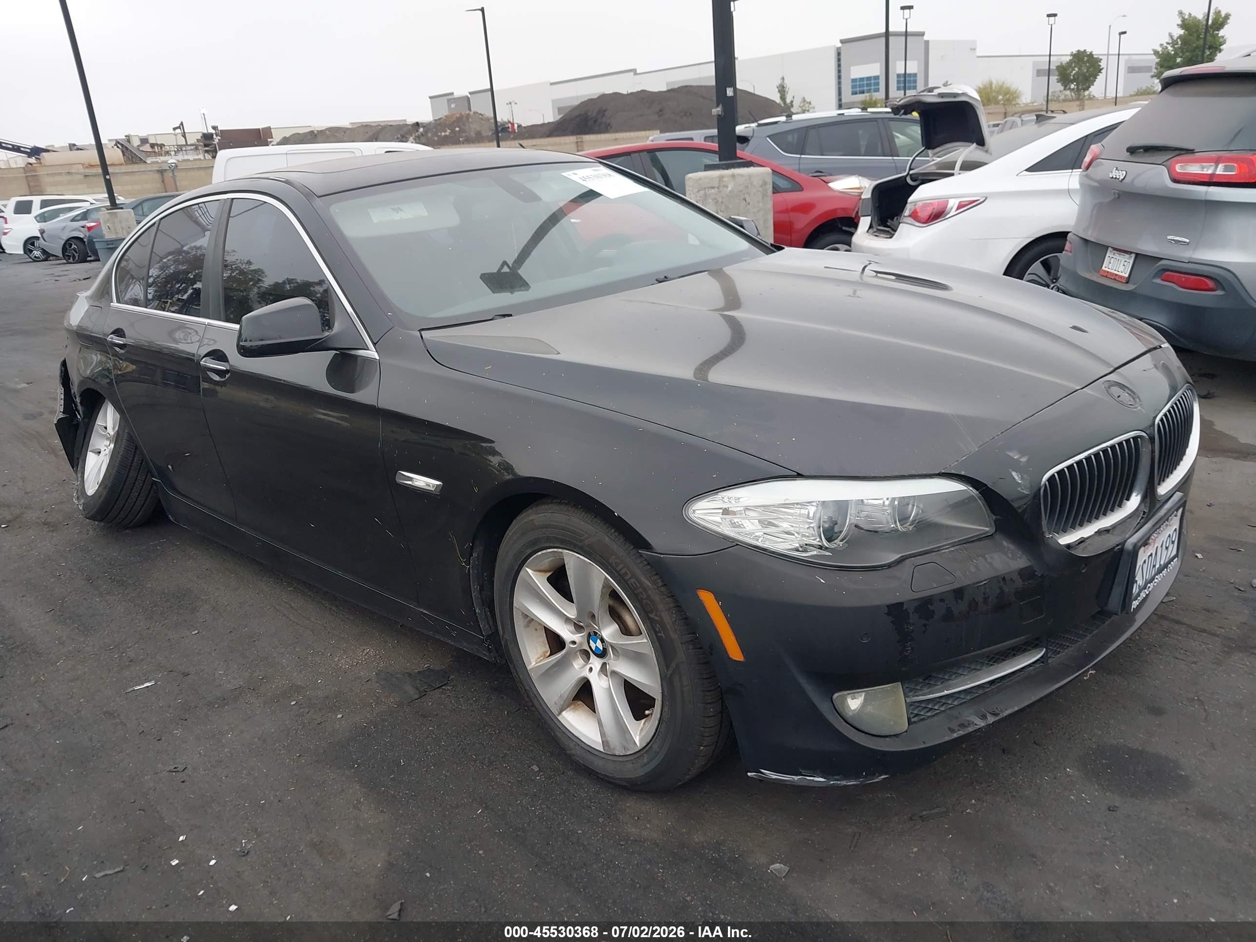 2011 BMW 5 Series 528i, VIN WBAFR1C59BC748077 — Rear end