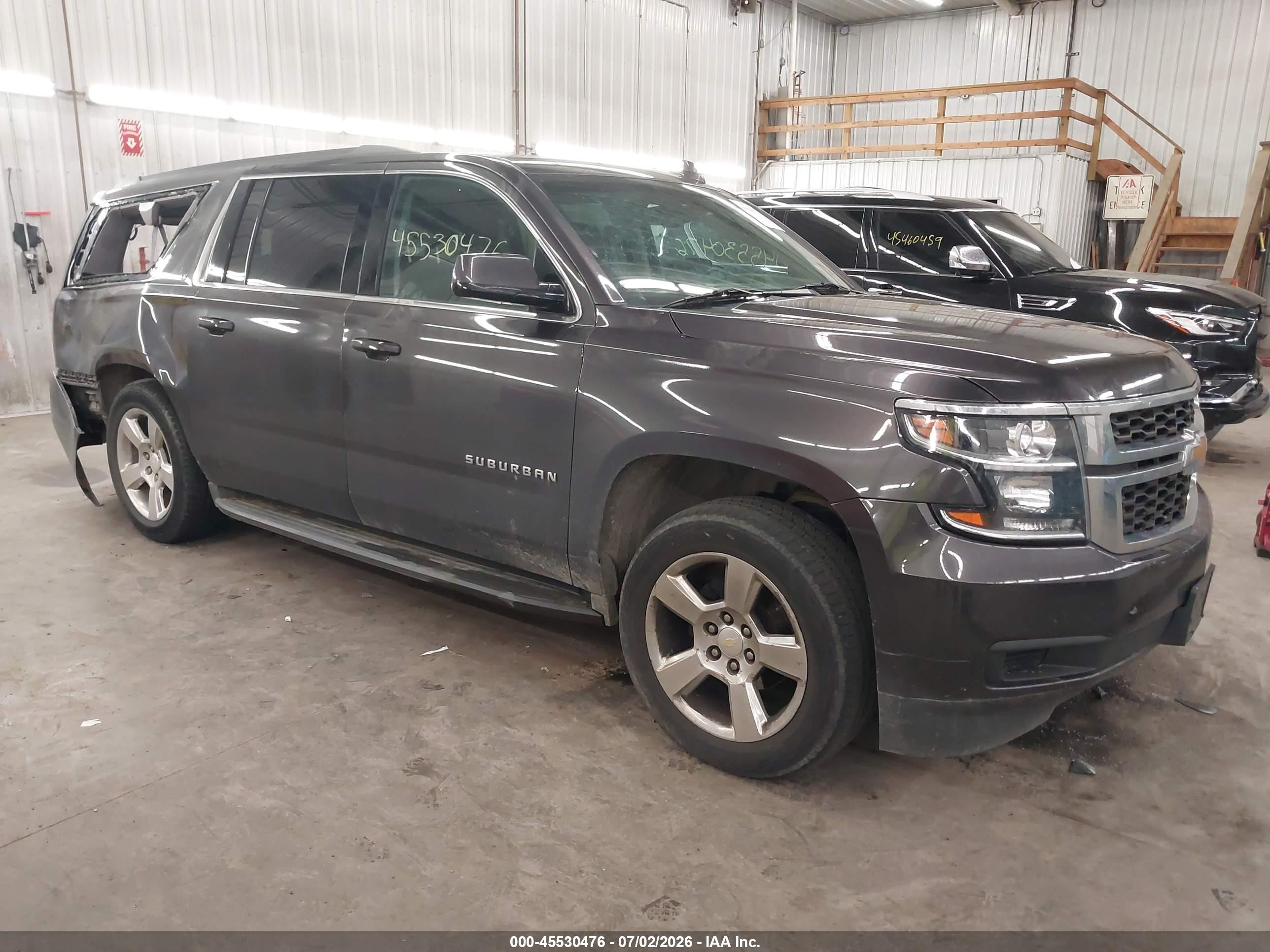2015 Chevrolet Suburban LT, VIN 1GNSKJKC3FR706861 — Зад
