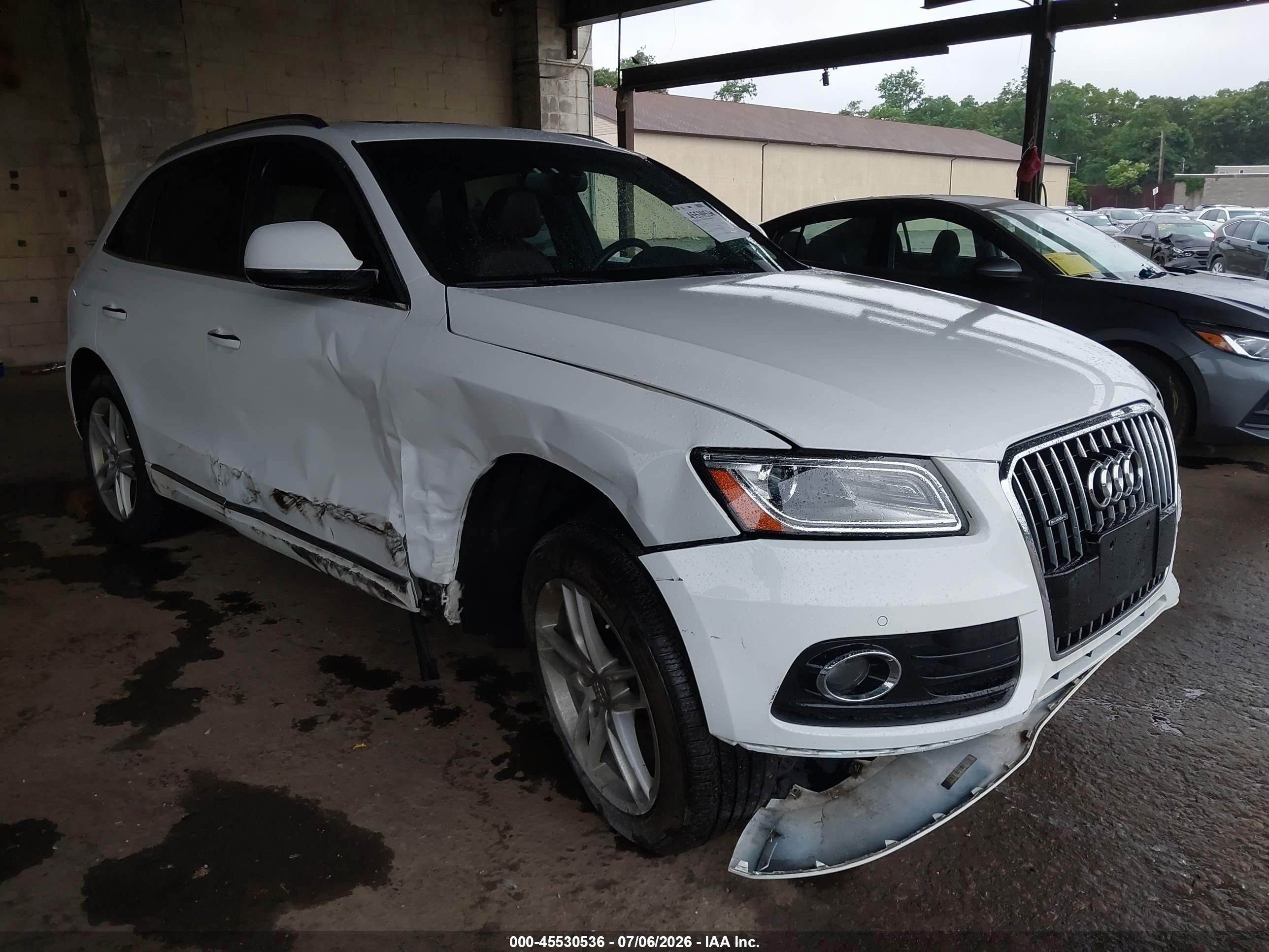2017 Audi Q5 Premium Plus, VIN WA1L2AFP8HA045995 — Side