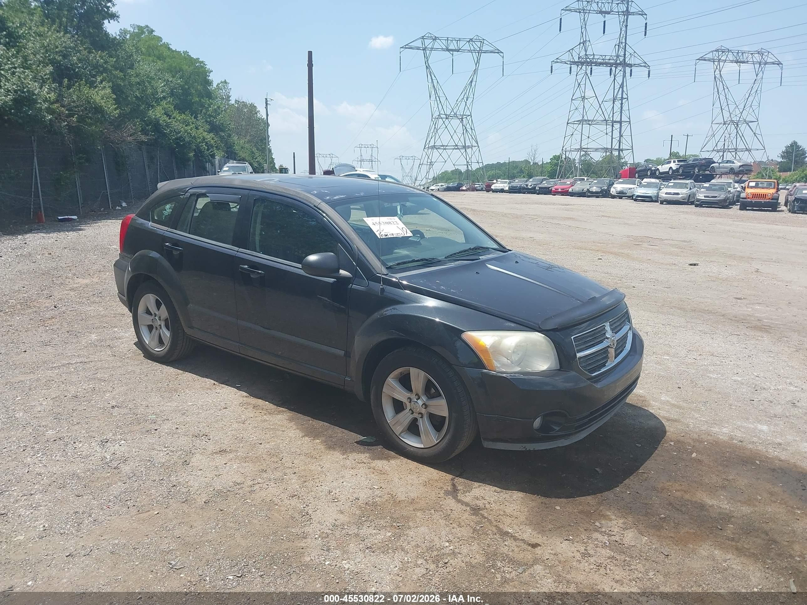 2011 Dodge Caliber Mainstreet, VIN 1B3CB3HA5BD163276 — Side