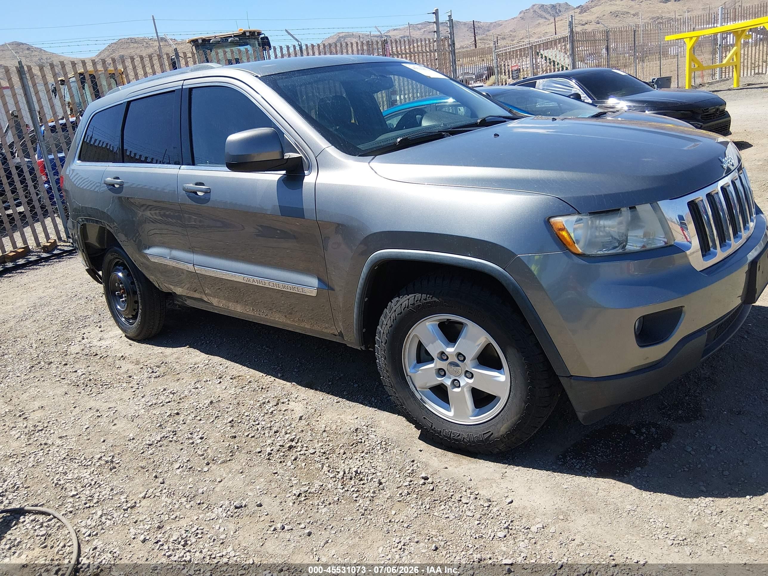 2013 Jeep Grand Cherokee Laredo, VIN 1C4RJFAG7DC507534 — Rear end