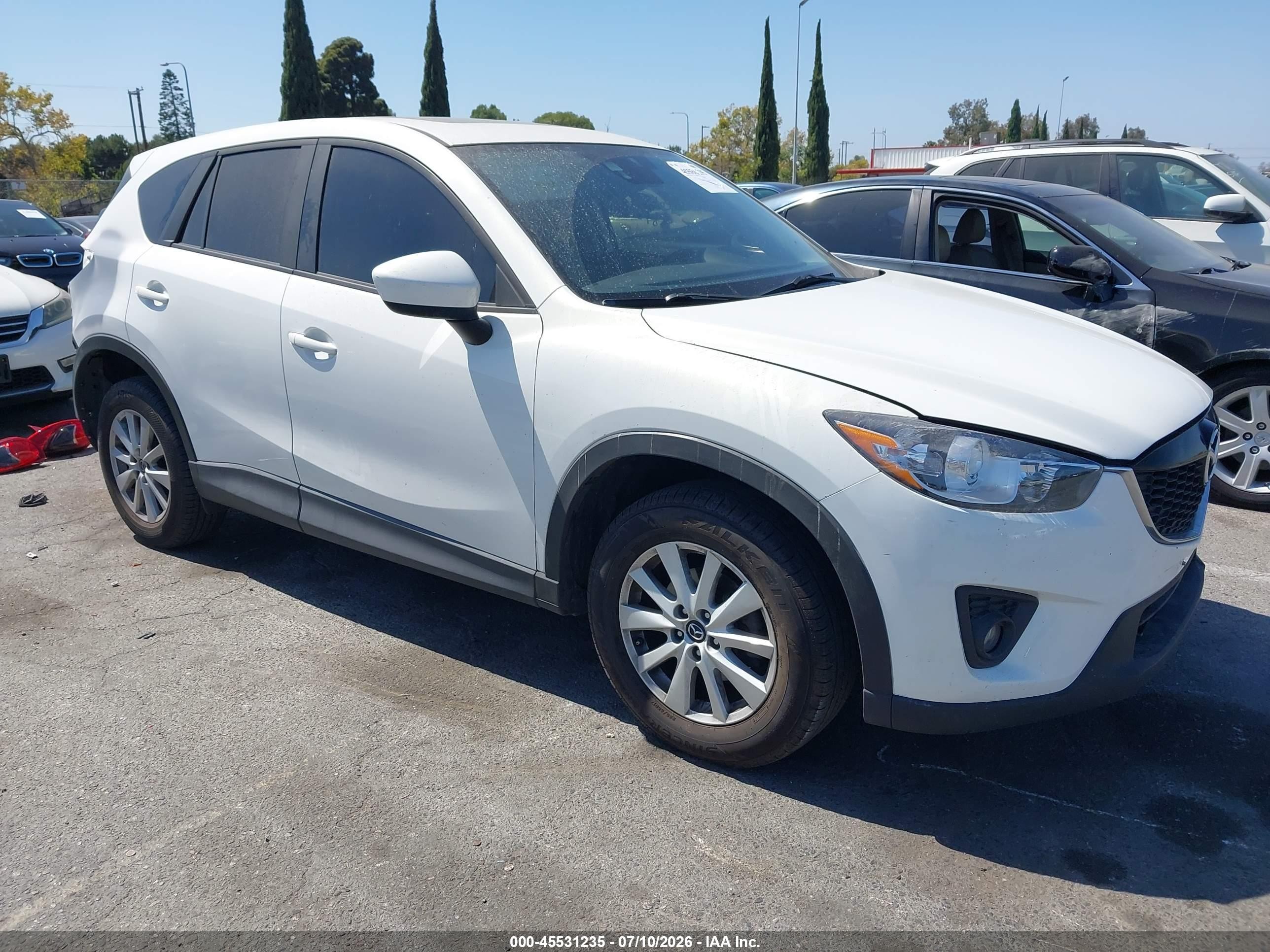 2014 Mazda CX-5 Touring, VIN JM3KE2CY7E0376801 — Rear end