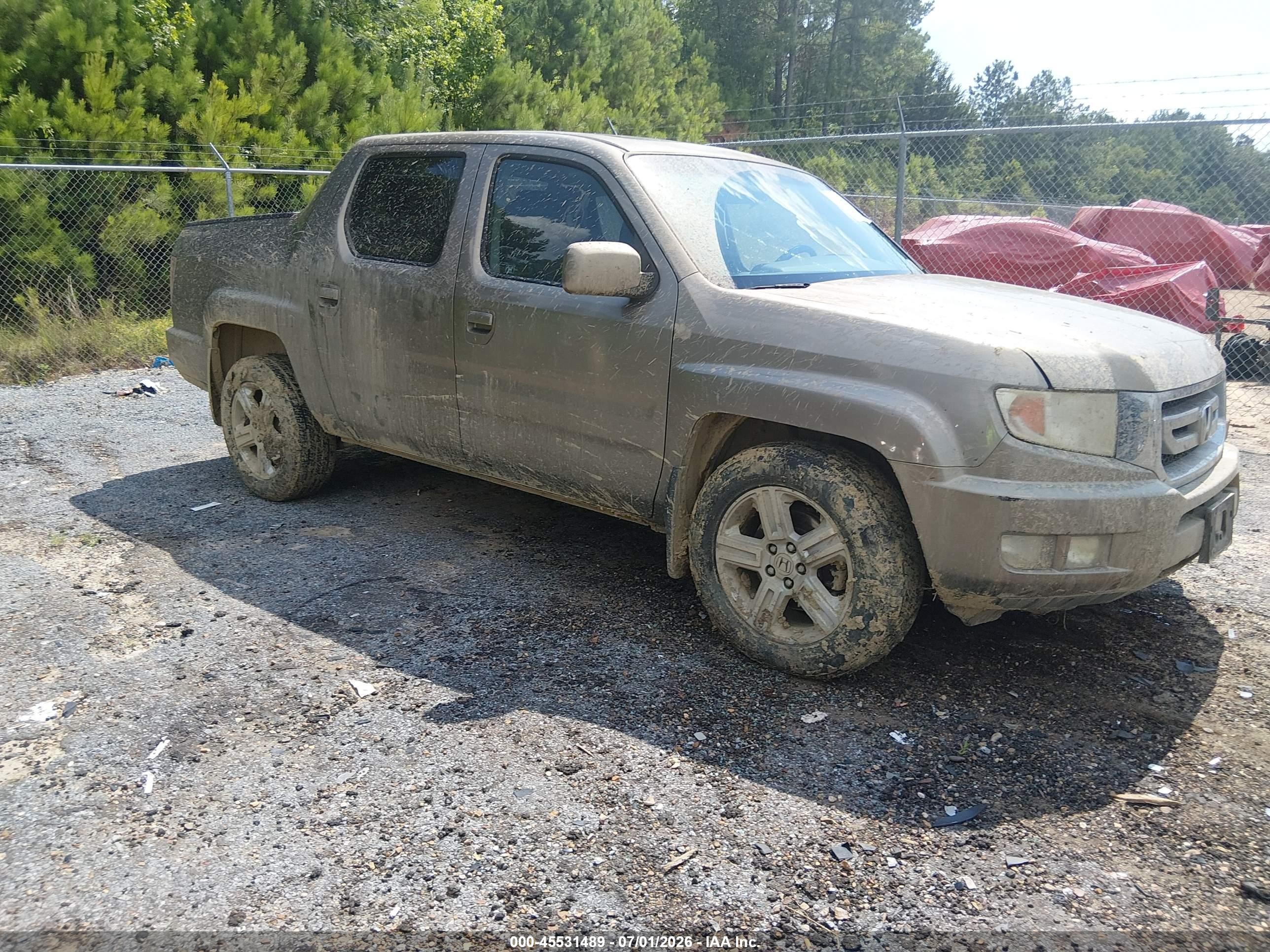 2009 Honda Ridgeline RTL, VIN 2HJYK16509H501108 — Side
