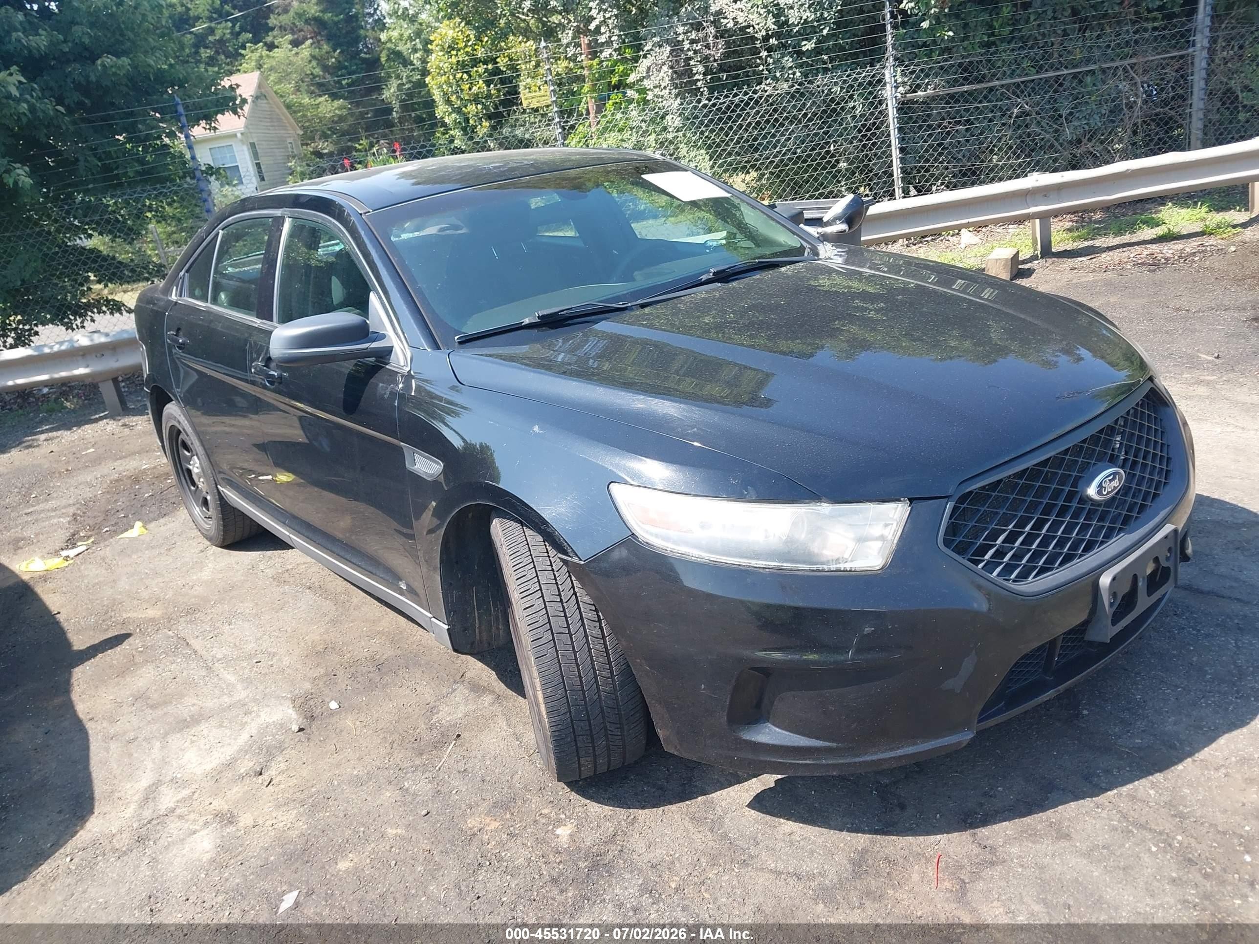 2014 Ford Police Interceptor, VIN 1FAHP2MT2EG124628 — Rear end